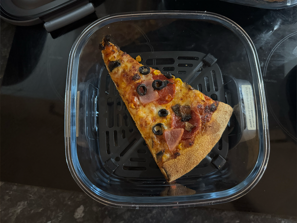 Re-crisping leftover pizza in the air fryer worked a treat (Alex Lee/The Independent)