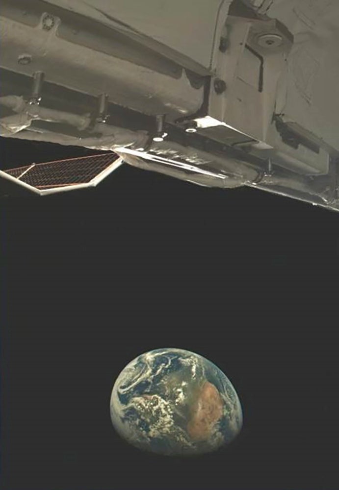 An X-37B onboard camera, used to ensure the health and safety of the vehicle, captures an image of Earth while conducting experiments in HEO in 2024