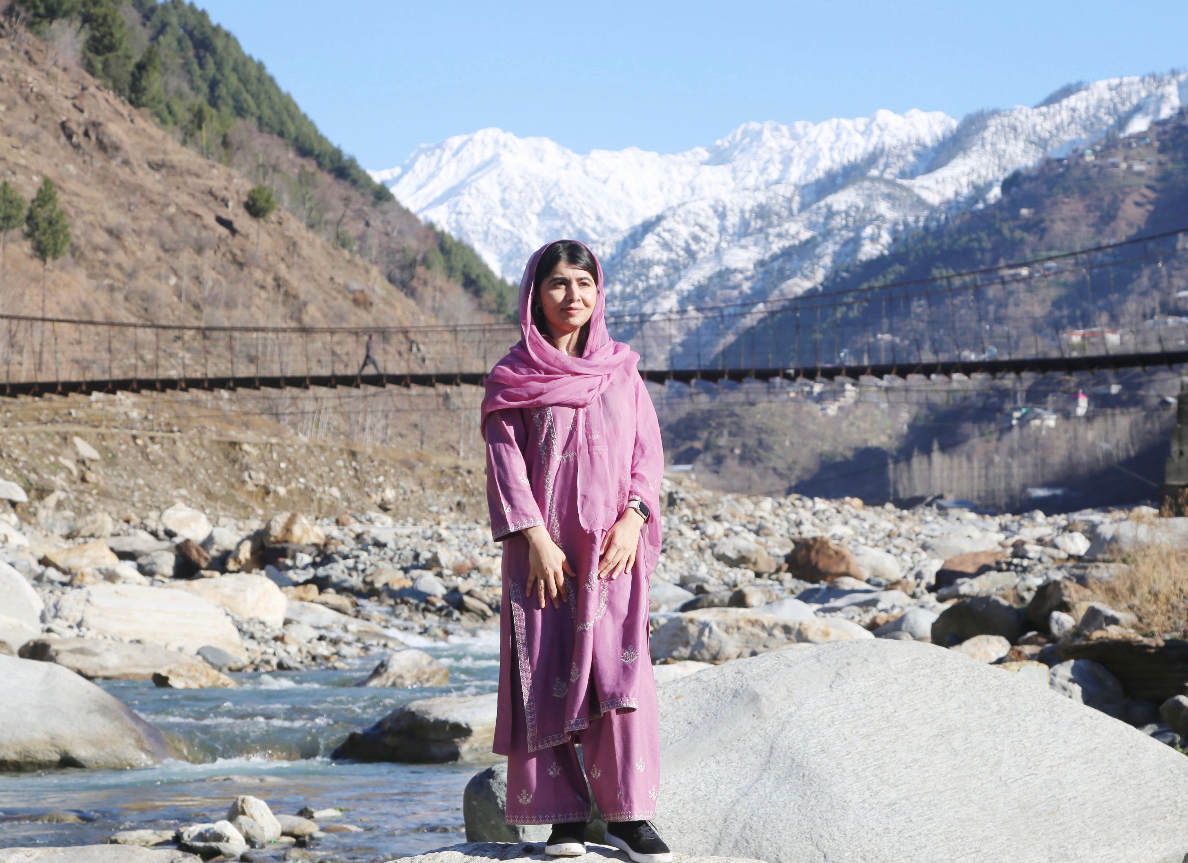 Malala Yousufzai poses for a picture in her hometown