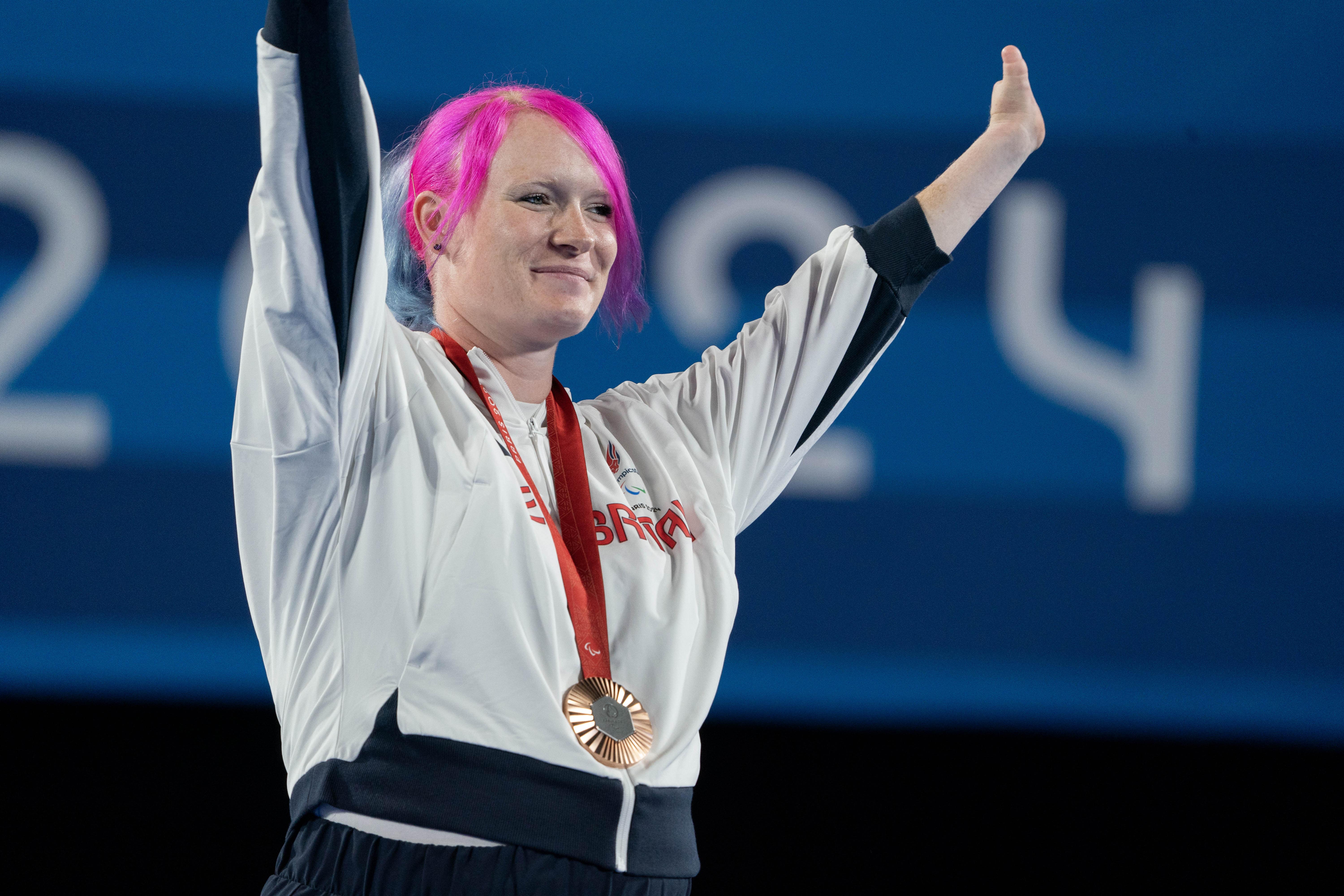 Jodie Grinham made history in Paris after previously being told she would never be able to hold a bow due to her disability (ParalympicsGB/PA)
