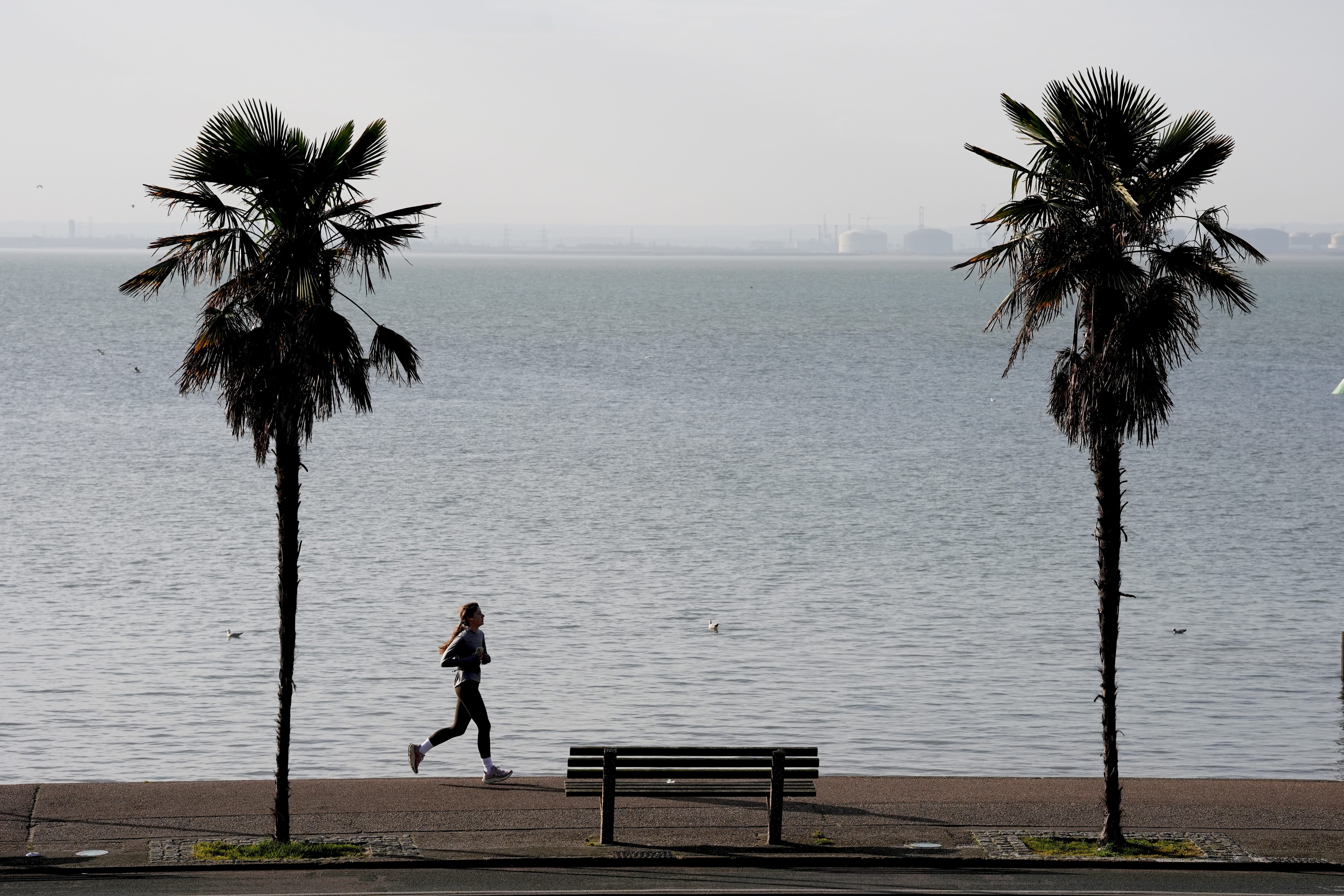 A jogger runs along the sea front in Southend-on-Sea, Essex (Stefan Rousseau/PA)