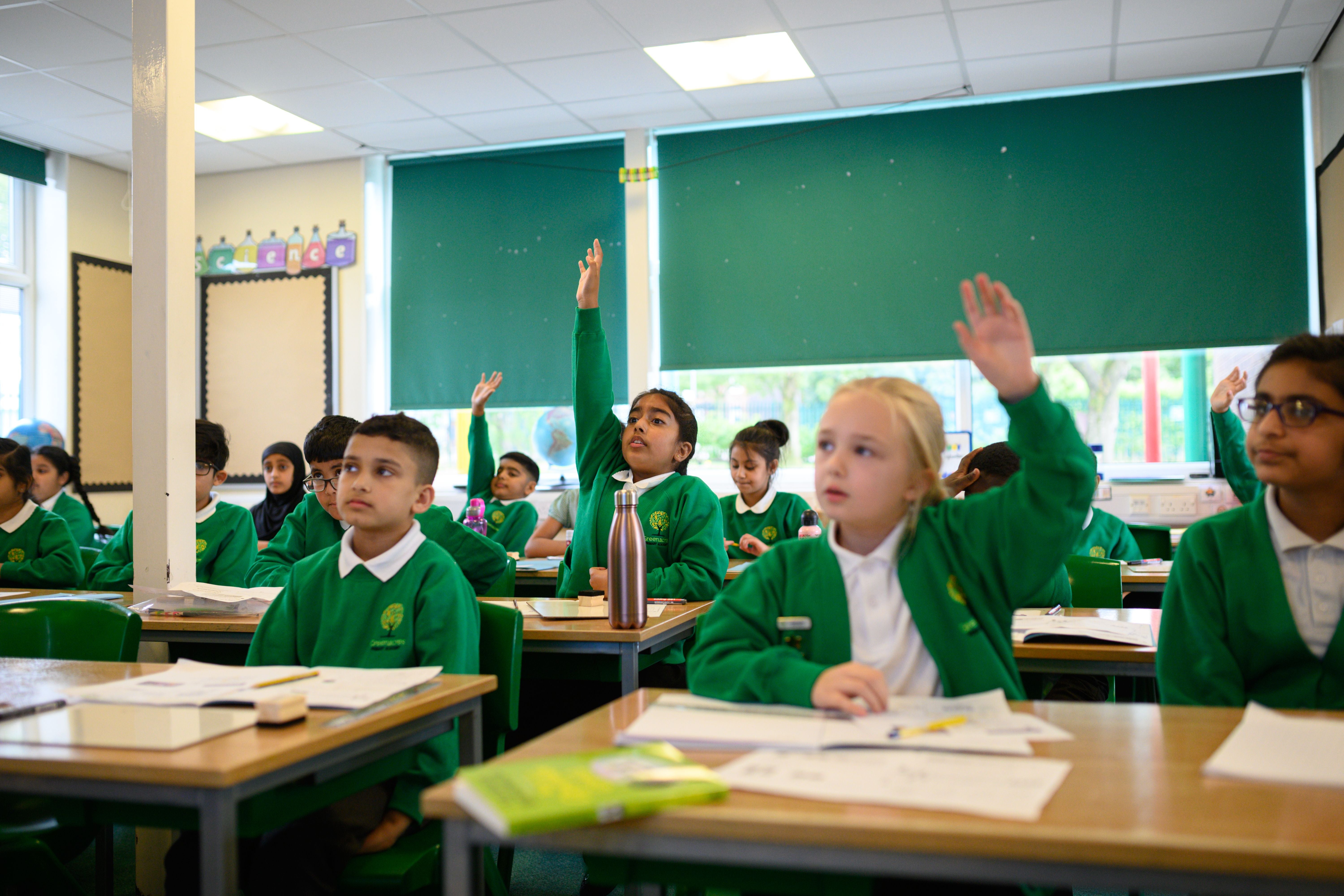 Year Five pupils take part in a maths class at Greenacres Primary Academy in Oldham, northern England on September 02, 2020.