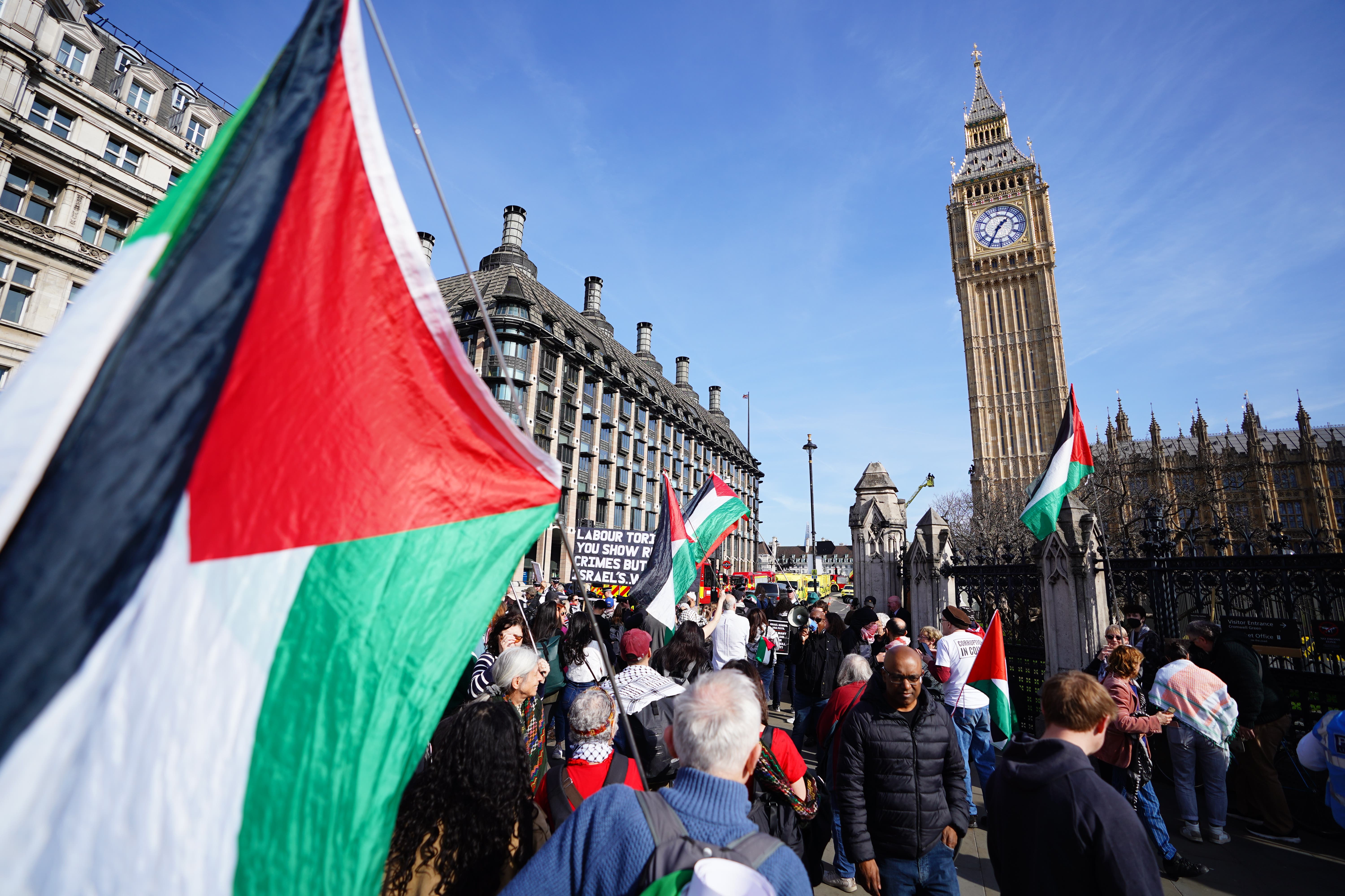 Pro-Palestine demonstrators in Parliament Square (James Manning/PA)