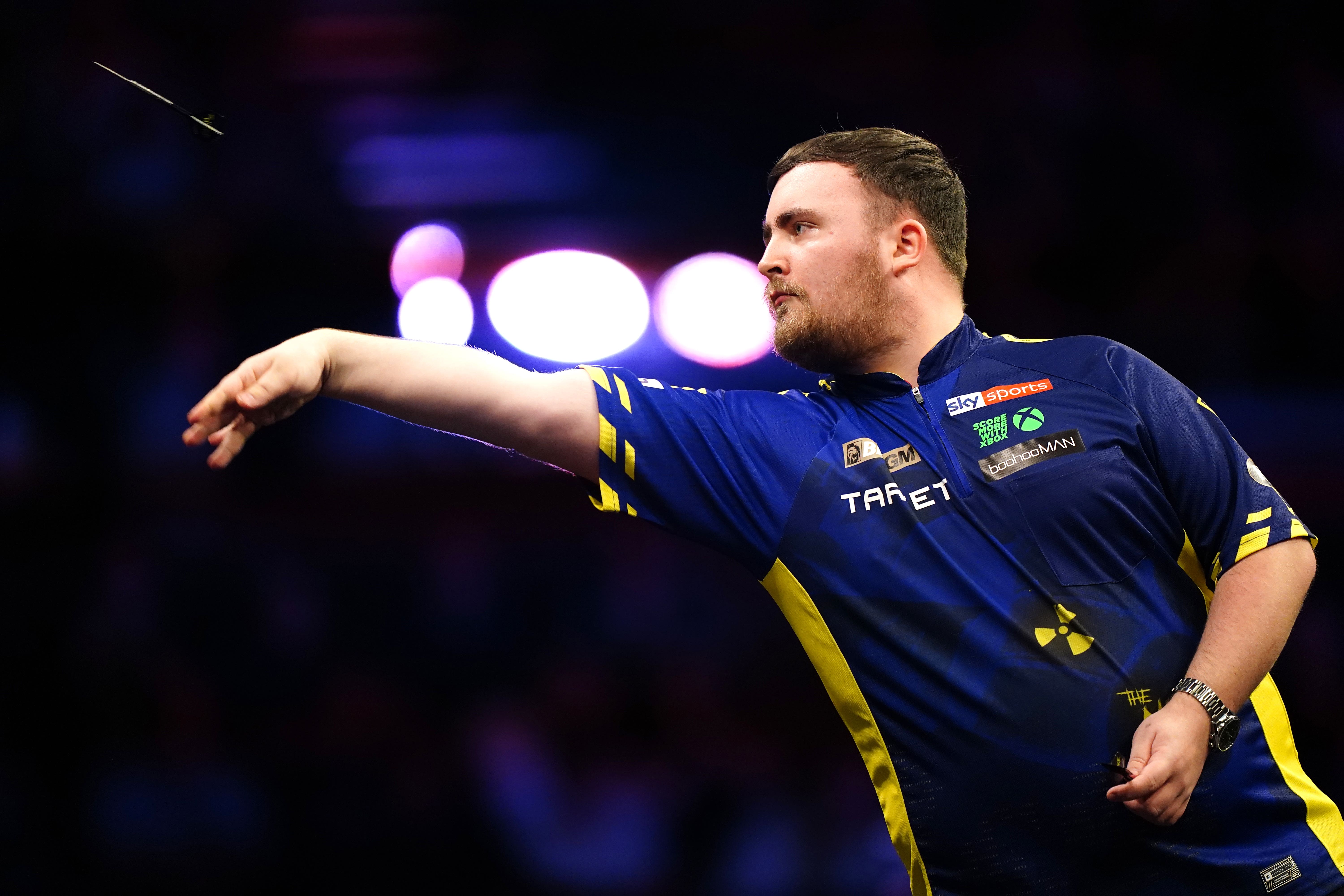 Luke Littler began the defence of his Belgian Darts Open title with a 6-3 win over Ryan Searle (Zac Goodwin/PA)