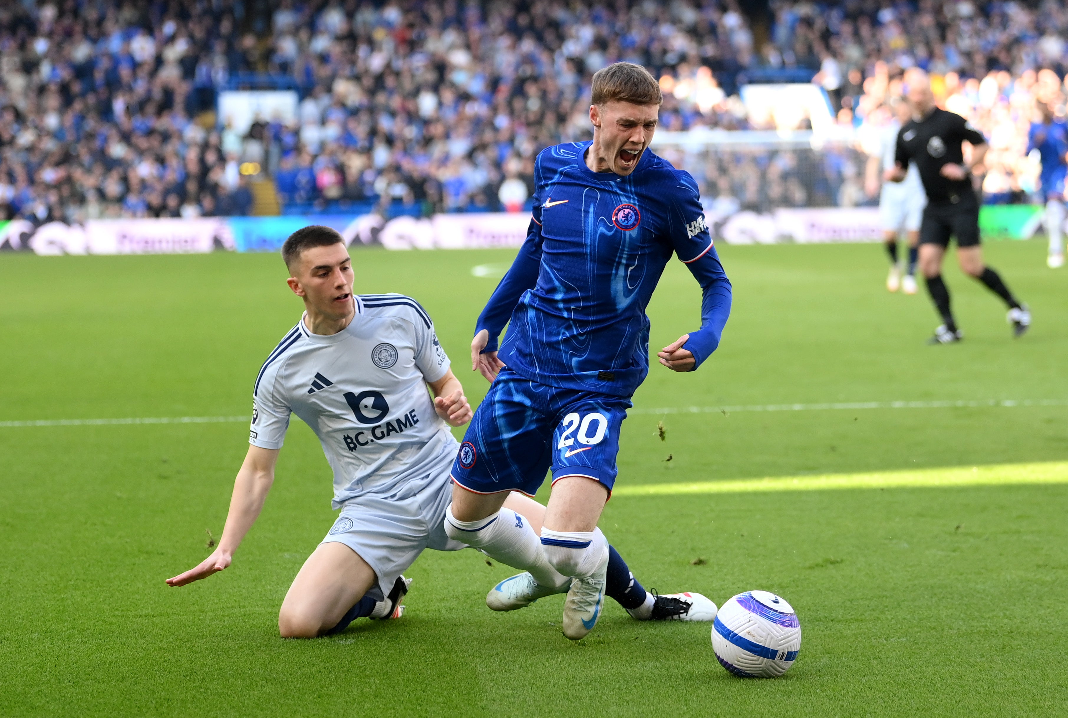 Cole Palmer is challenged in the box by Luke Thomas