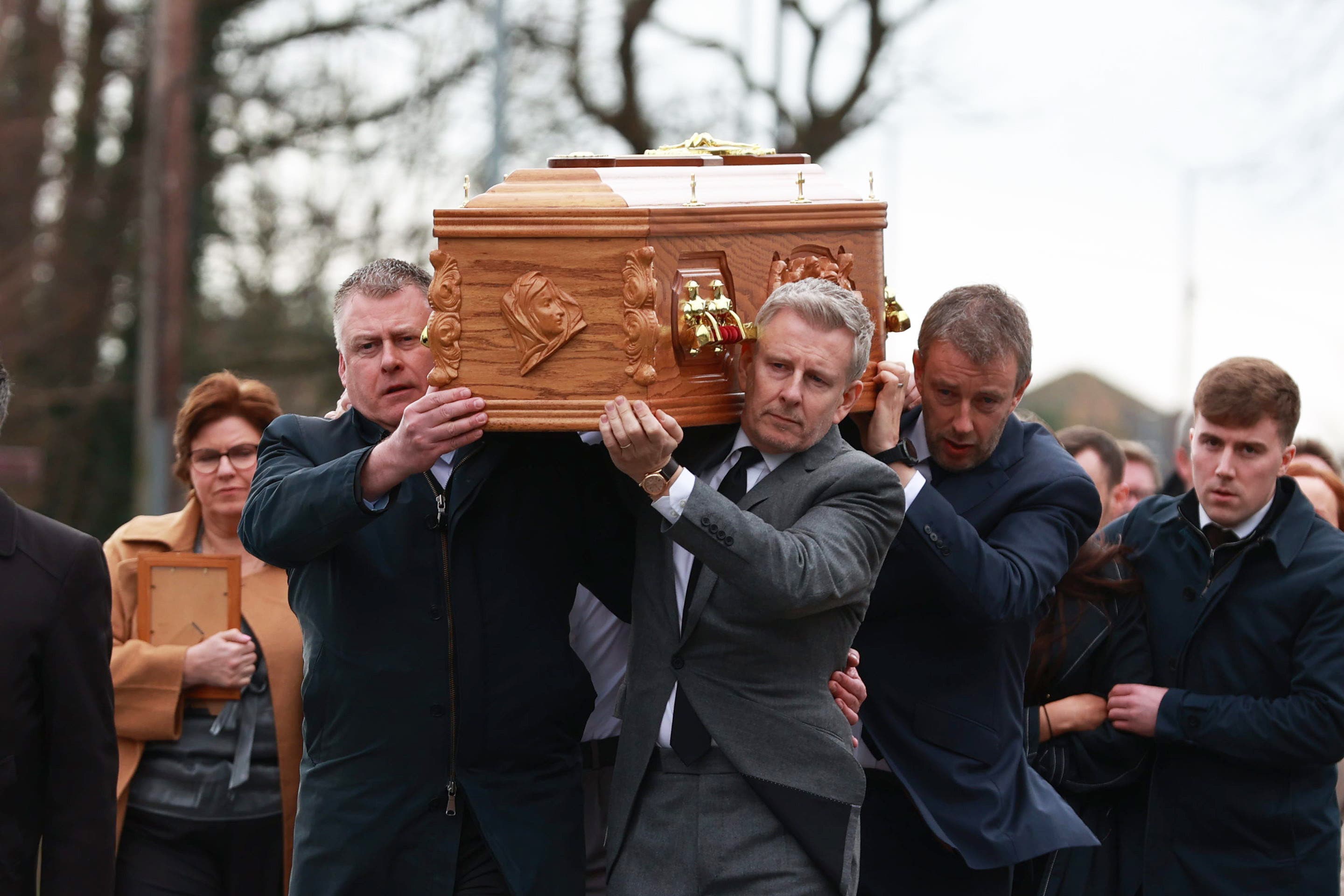 The Late Late Show host, right, was among the pallbearers (Liam McBurney/PA)