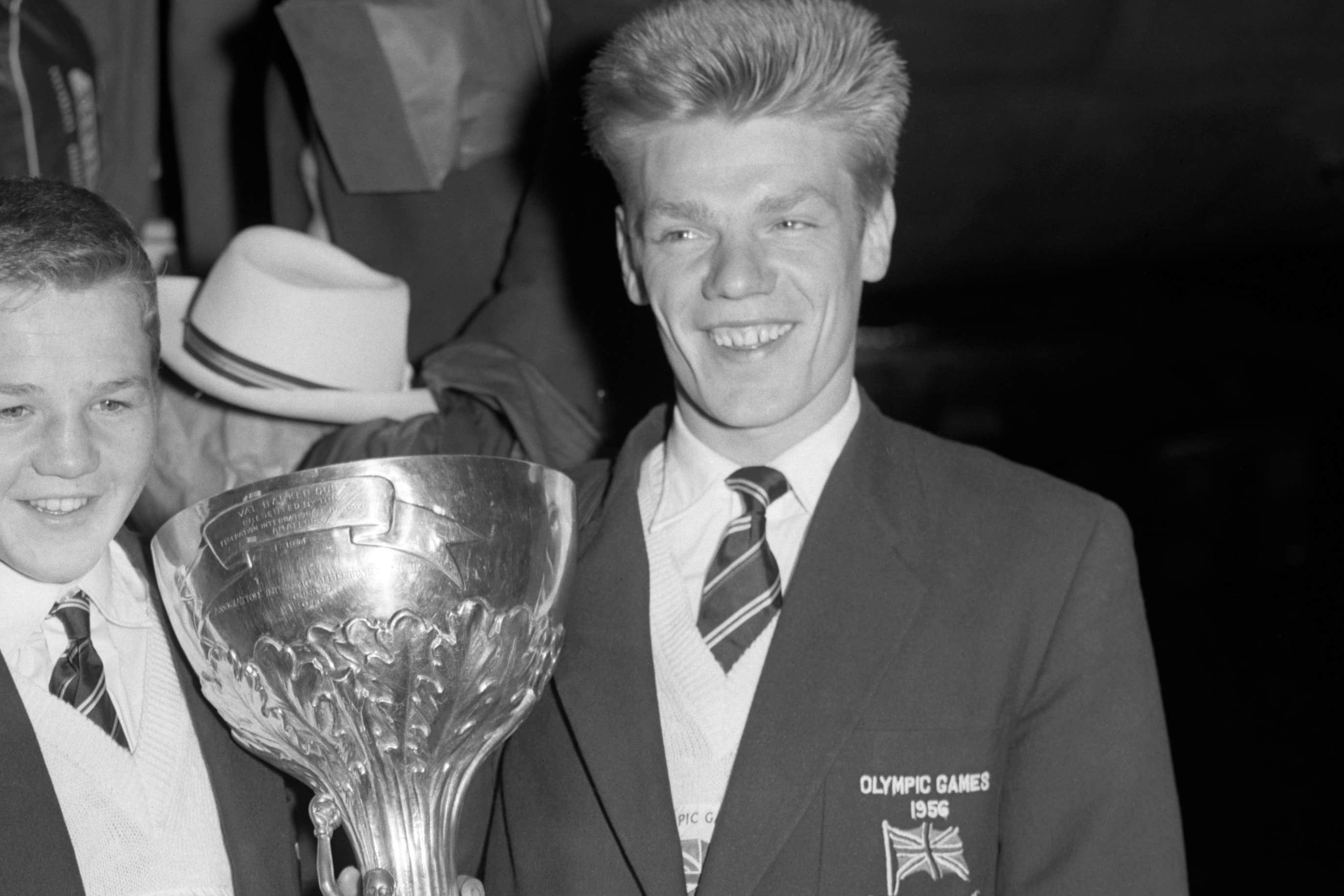 Dick McTaggart holds the Val Barker Cup for the most stylish boxer at the 1956 Olympics (PA Archive)