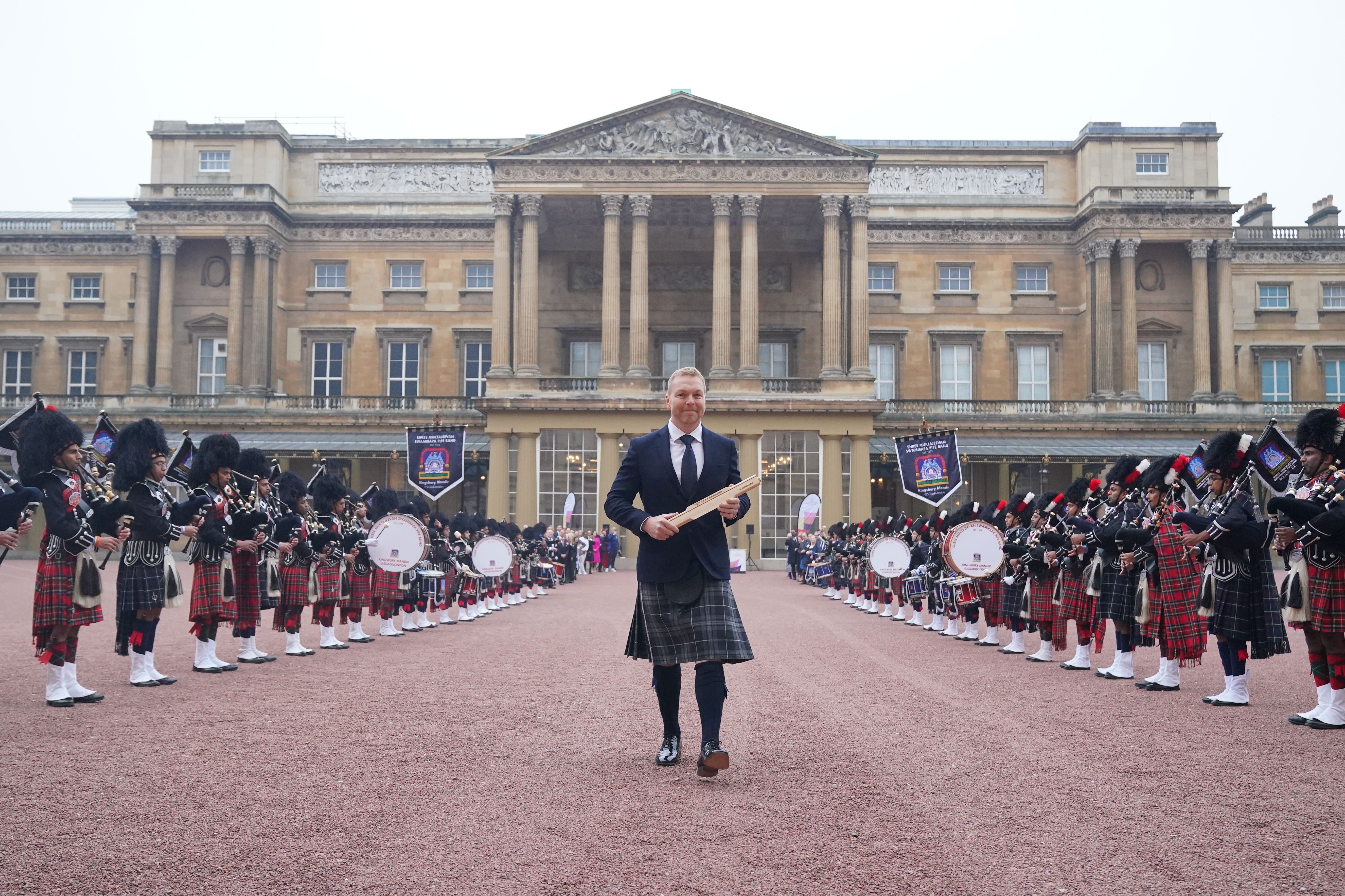 Sir Chris Hoy started the King’s Baton Relay at Buckingham Palace (Jonathan Brady/PA)