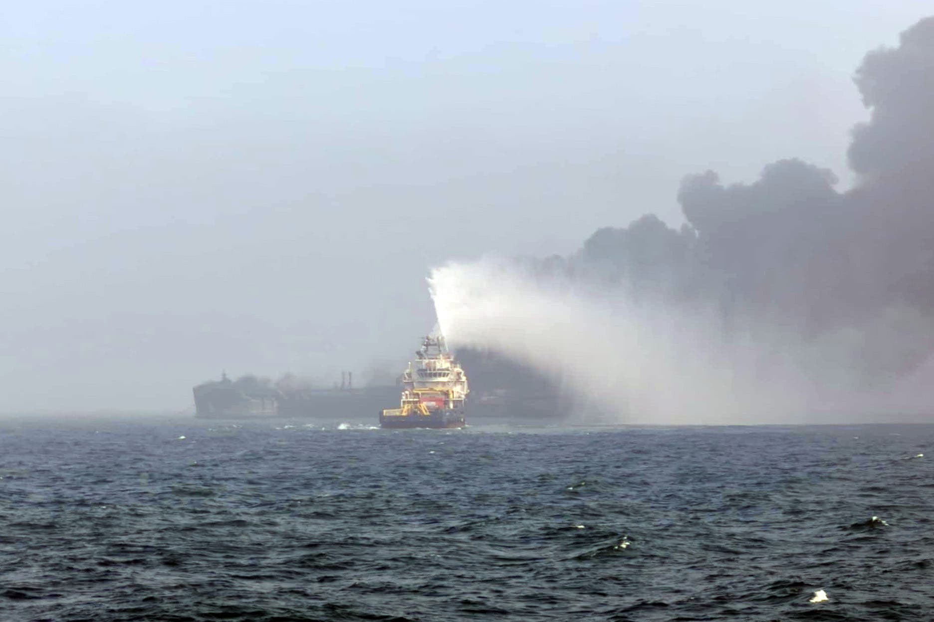 Smoke billowing into the air after a crash between an oil tanker and a cargo ship off the coast of East Yorkshire (Bartek Smialek/PA)