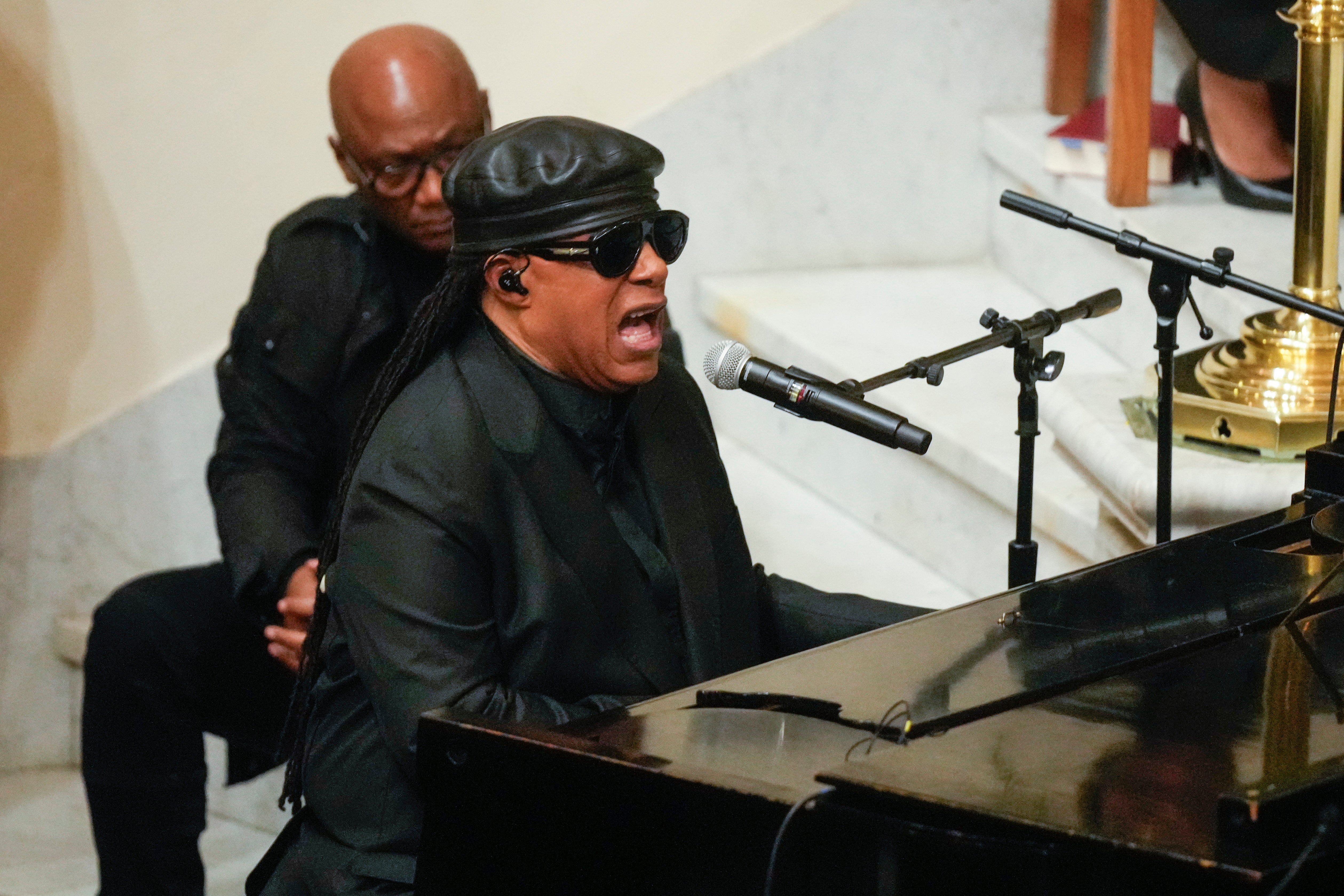 Stevie Wonder performs during Roberta Flack’s memorial service