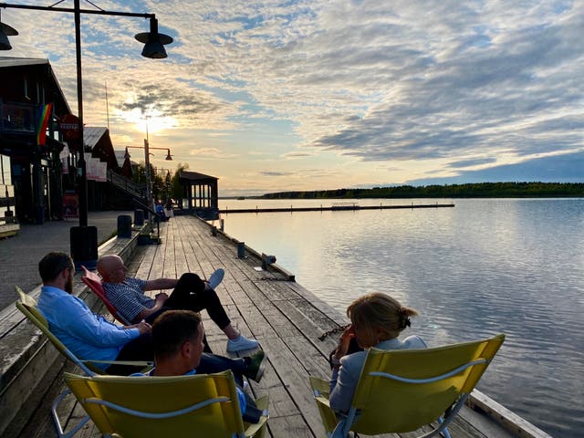 <p>Time for a sundowner? Tourists kick back in Lulea, Sweden </p>