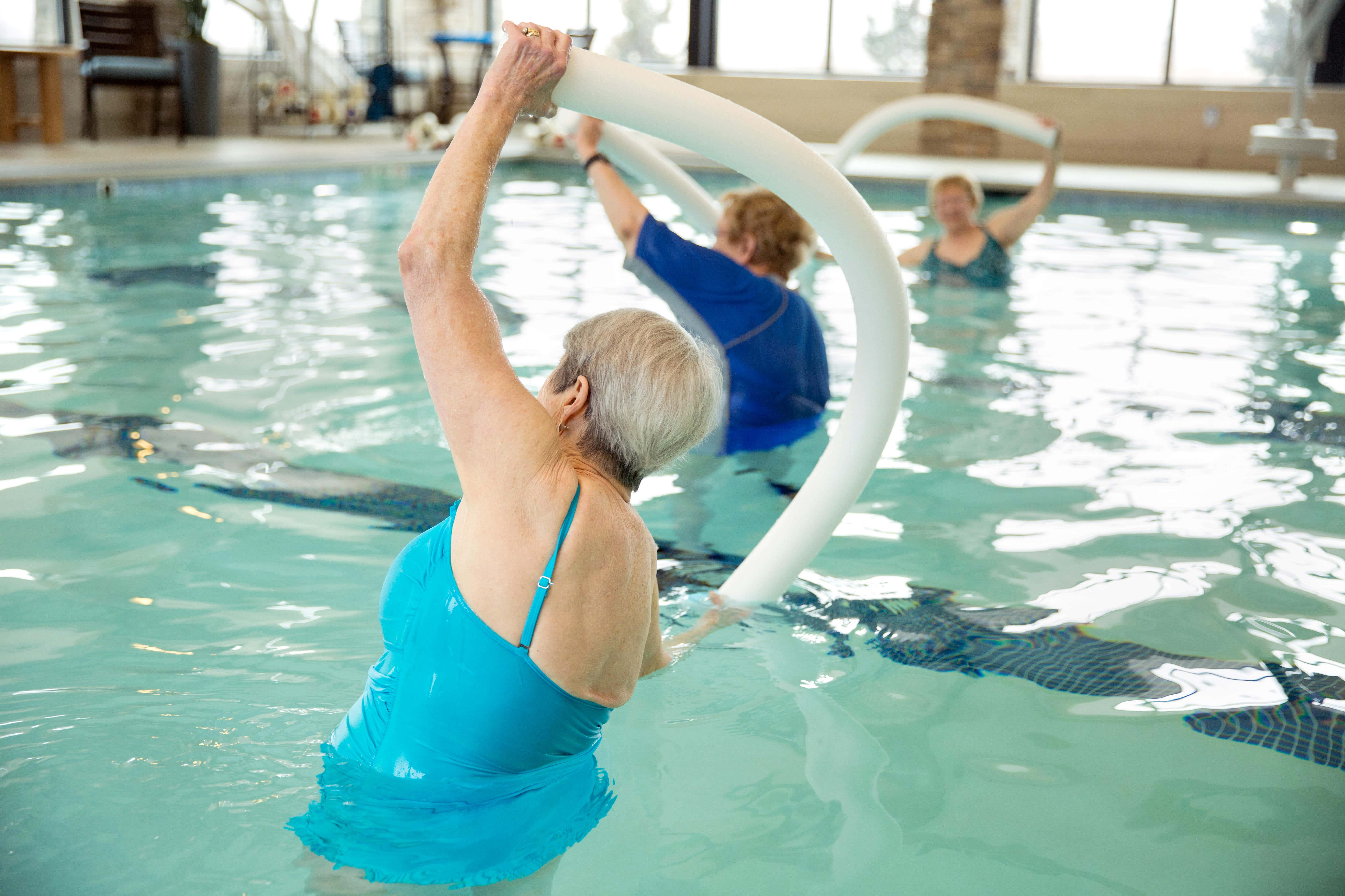 A new study has found water aerobics can tackle bulging waistlines (Alamy/PA)