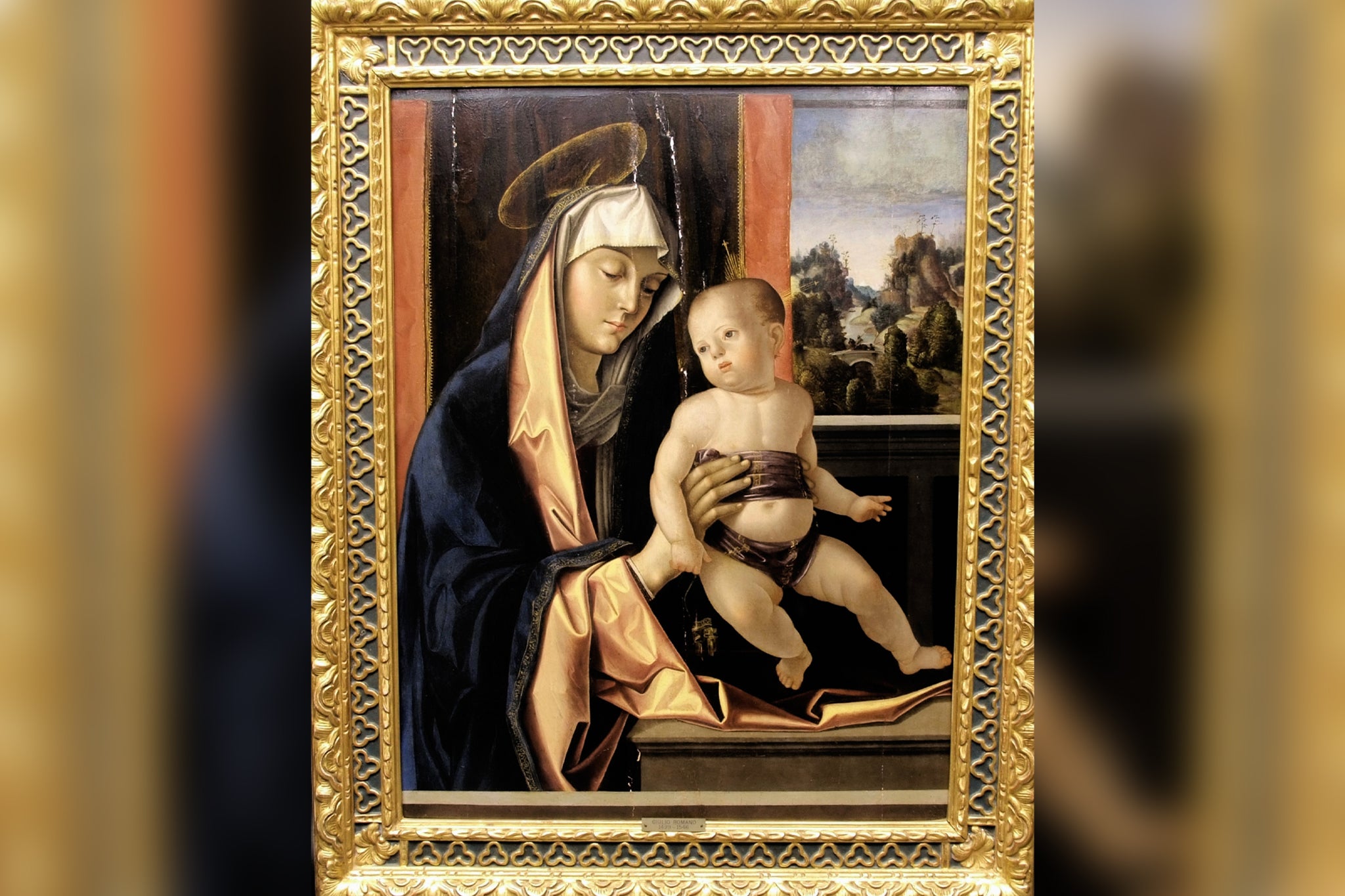 The 16th-century painting “Madonna and Child” by Italian painter Antonio Solari