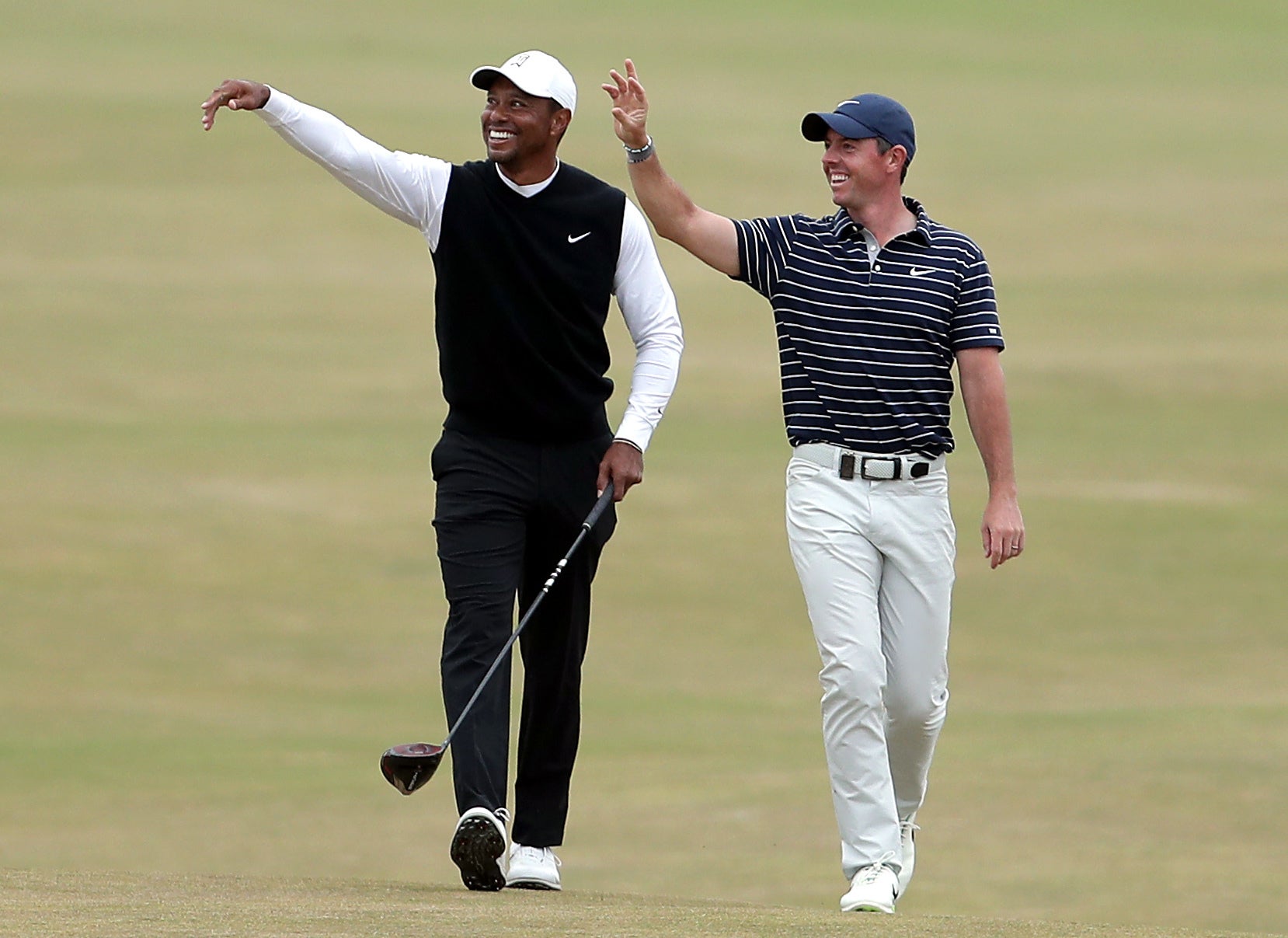 Rory McIlroy (right) said it “sucks” to hear of the latest injury suffered by Tiger Woods (Richard Sellers/PA)
