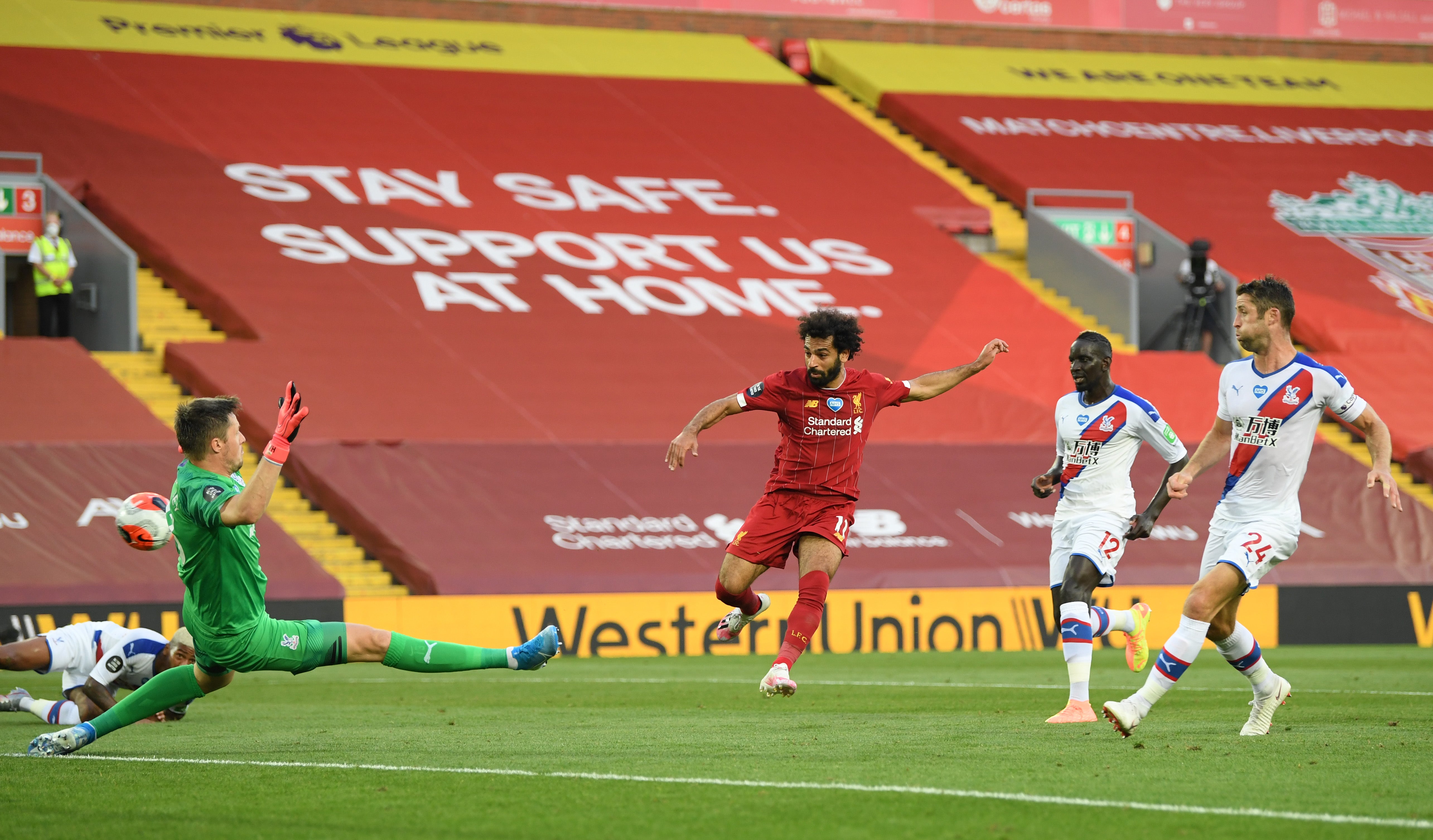 Mohamed Salah scores a goal for eventual champions Liverpool in June 2020