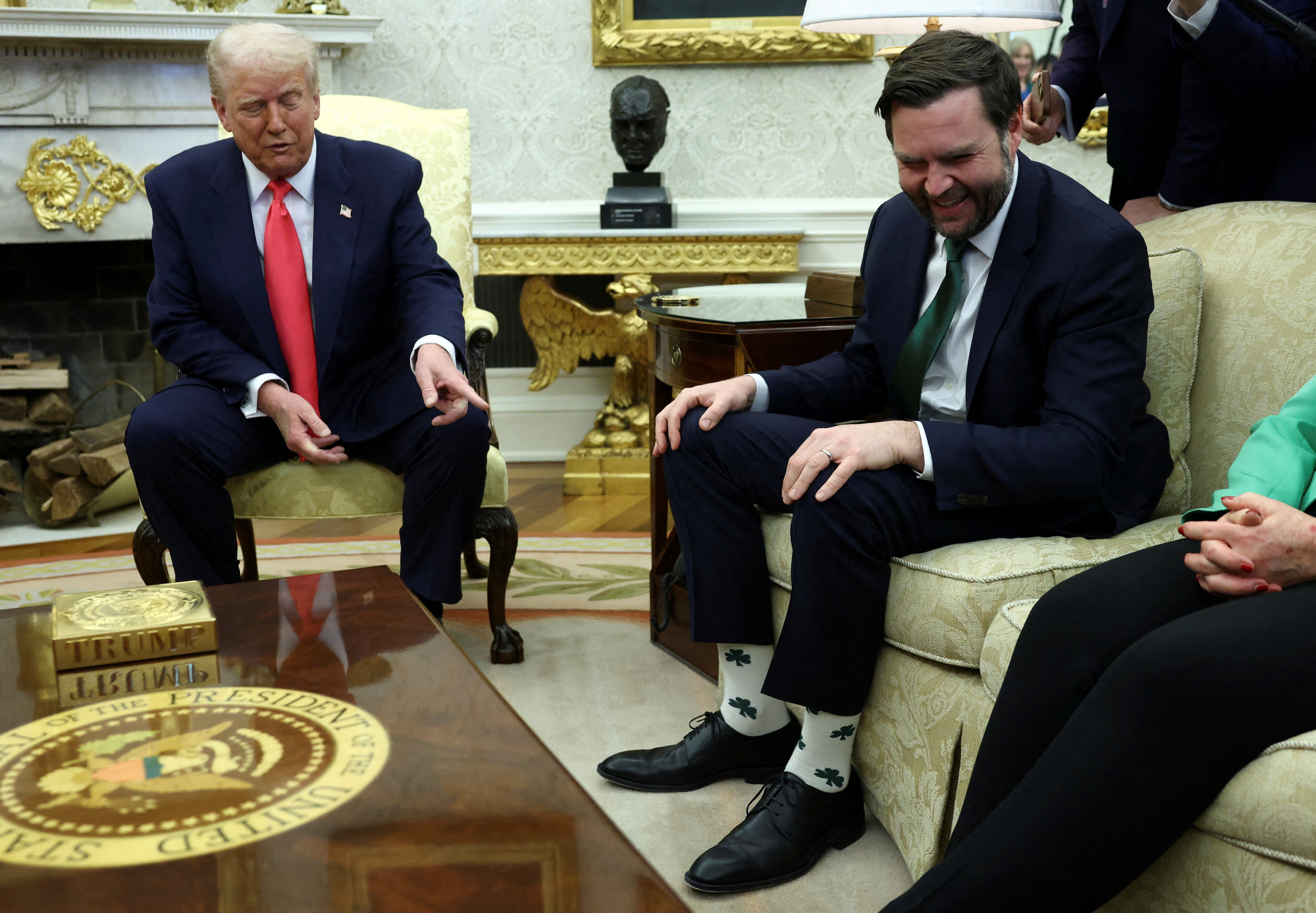 Trump pointing out Vance’s St Patrick’s Day socks in the Oval Office in March