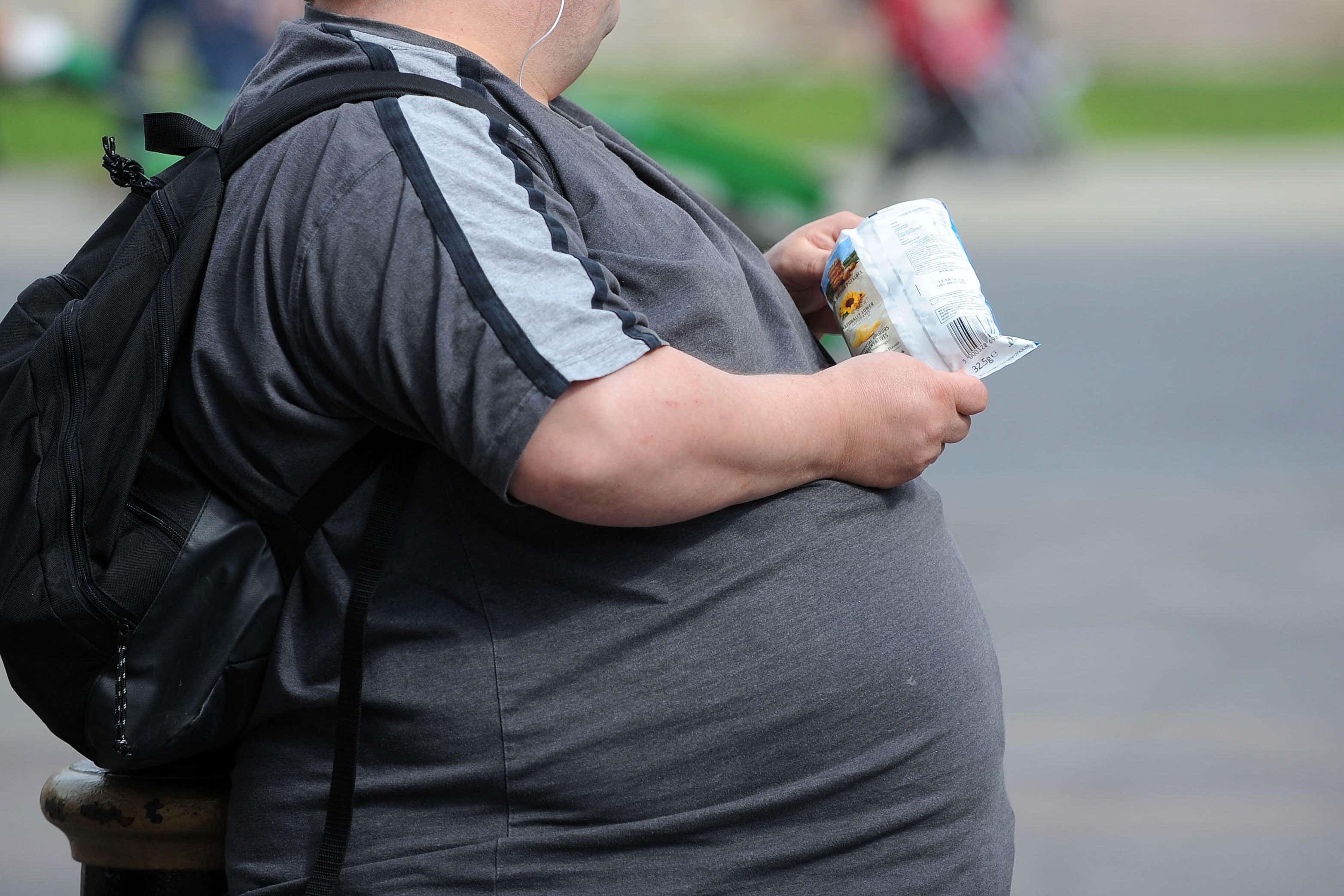 Being married increases the risk of obesity in men, research has found (Alamy/PA)