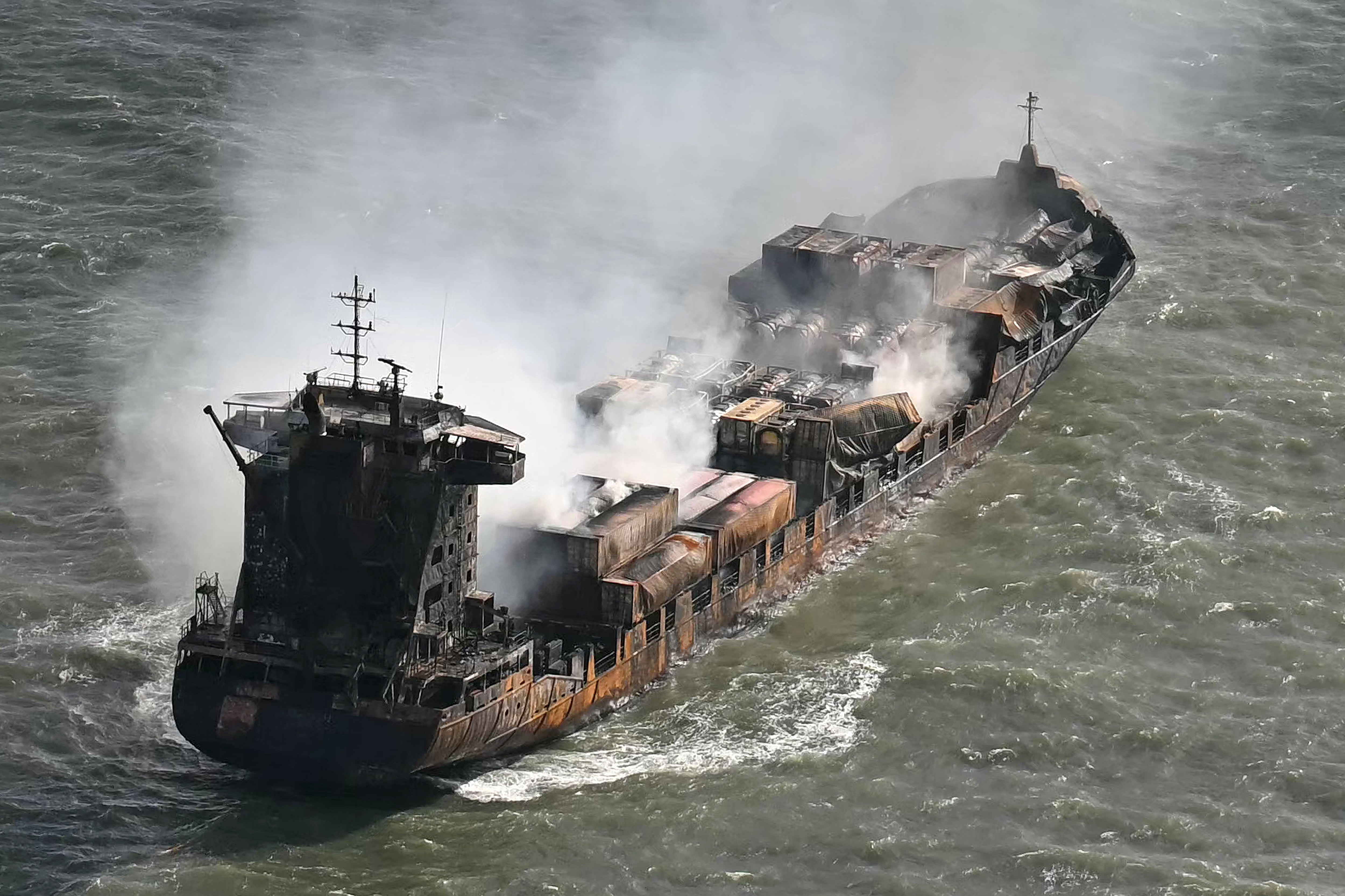 Smoke rises from the cargo ship Solong