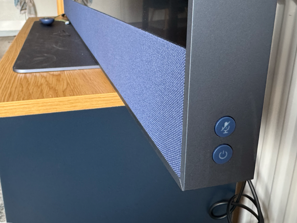 The soundbar is now colour-matched to the TV frame, and there are two buttns on the right side (Alex Lee)