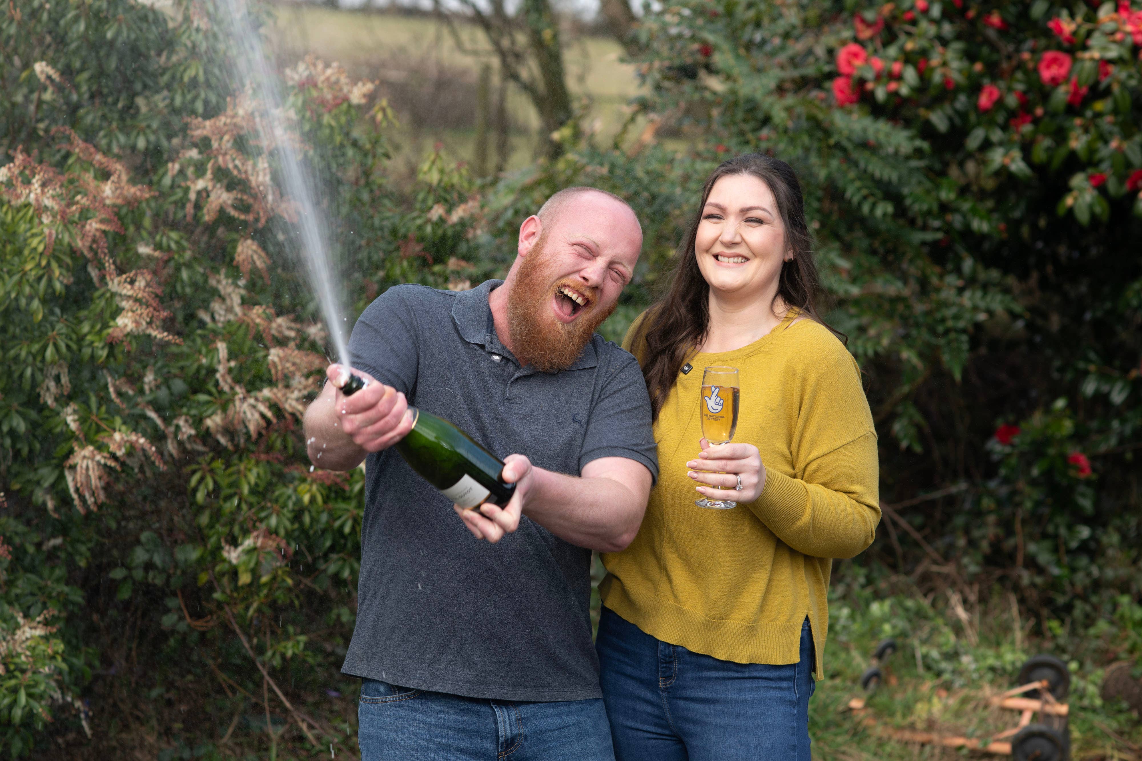 Craig and Zoe Haggie celebrate their £1 million scratchcard win