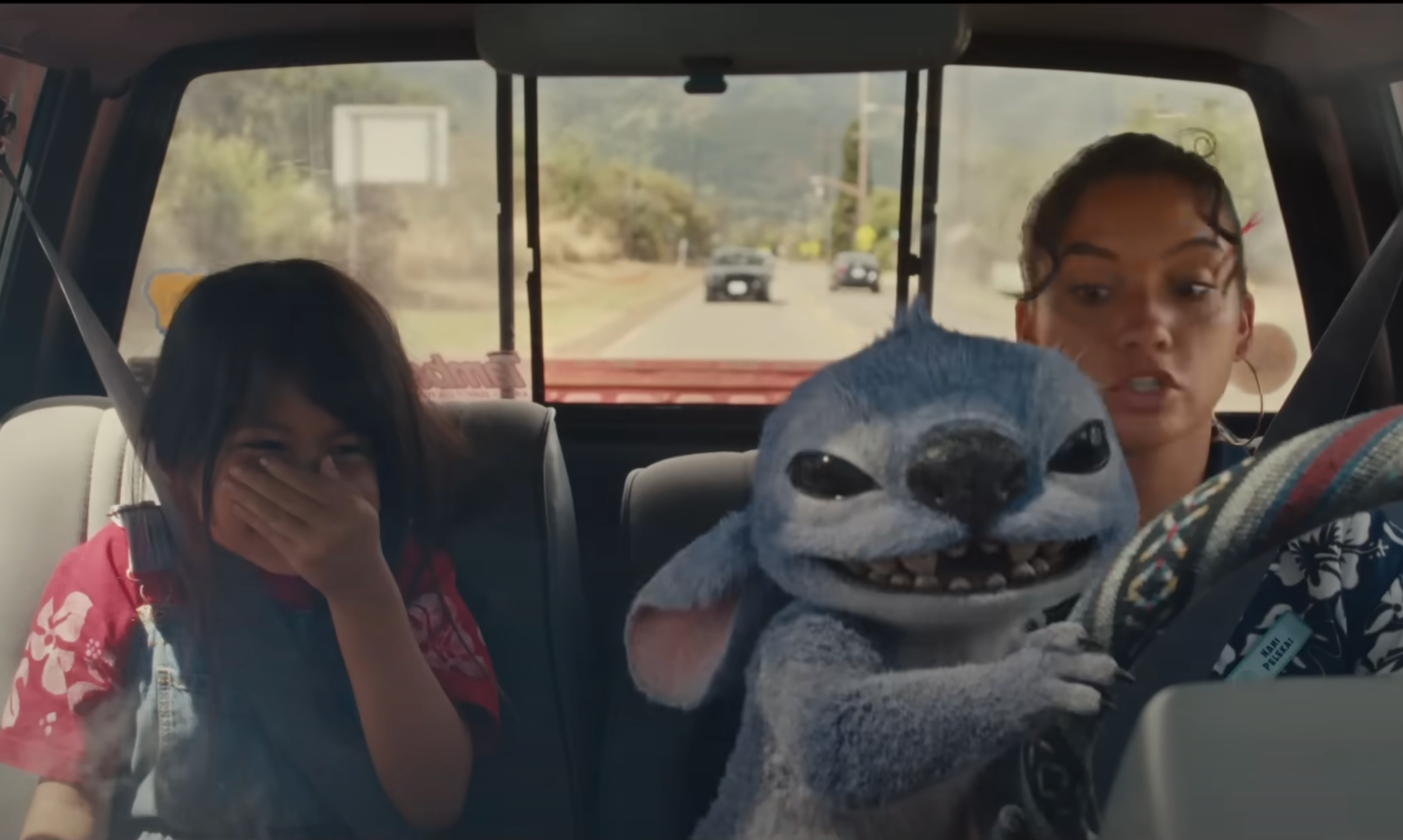 Maia Kealoha, Chris Sanders and Sydney Agudong in the ‘Lilo & Stitch' trailer