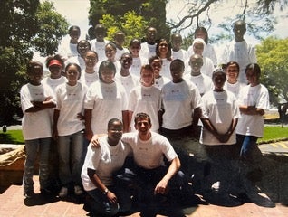 ‘I wanted to help other people have those chances’: Mason with KMF Scholars in 2003