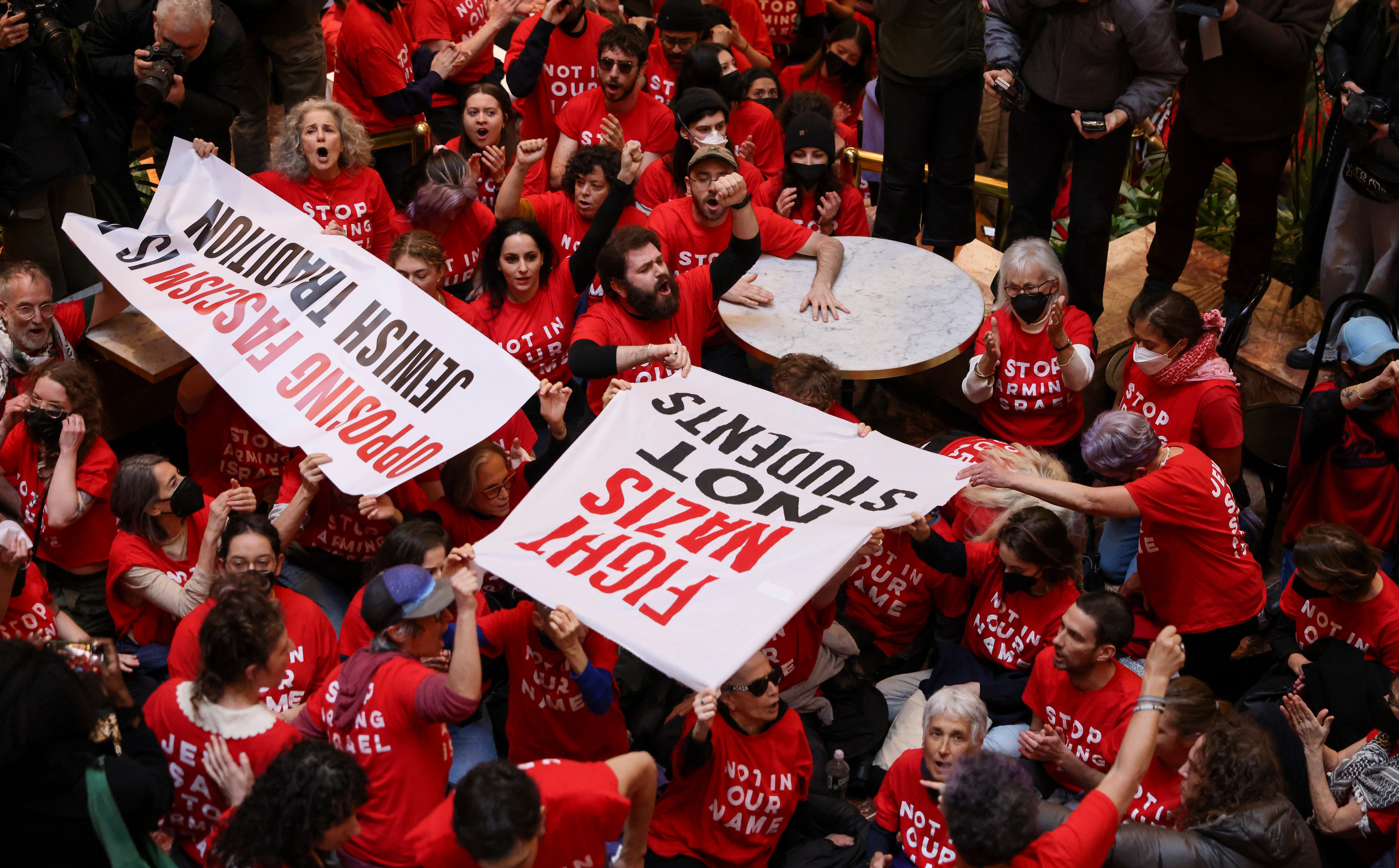 Trump Tower was filled with protesters on Thursday as they demanded a ‘Free Palestine’ and the release of a student being held for deportation