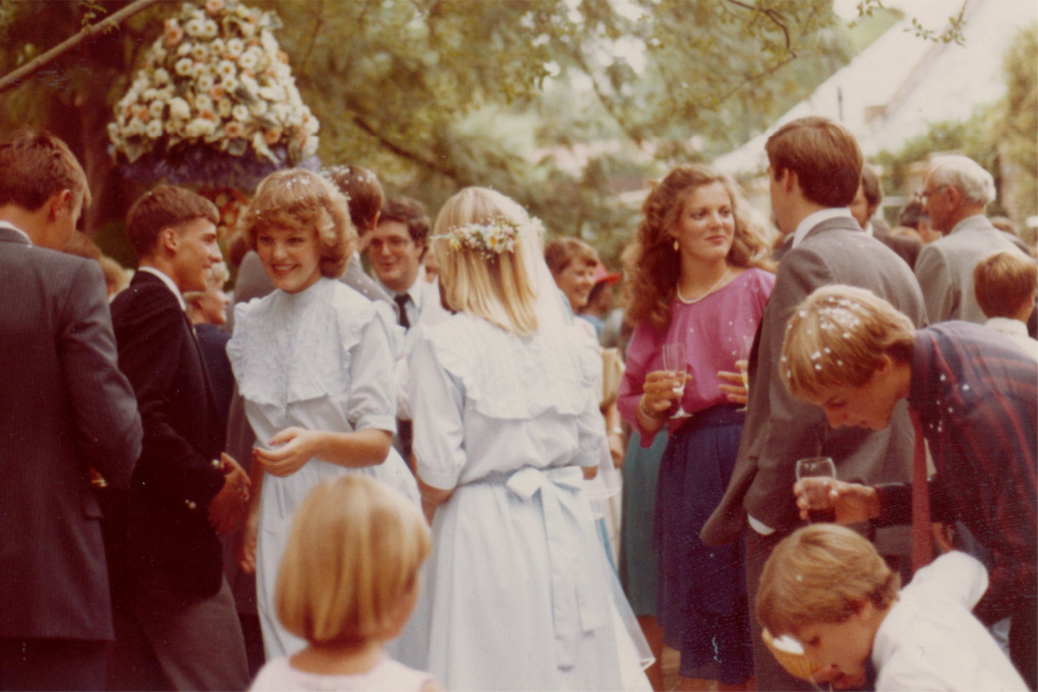 <p>Kay Mason (white dress facing camera) and Richard Mason (white shirt bottom right) at a wedding in the mid-1980s. The charity founded in Kay’s name has helped hundreds of people around the world</p>