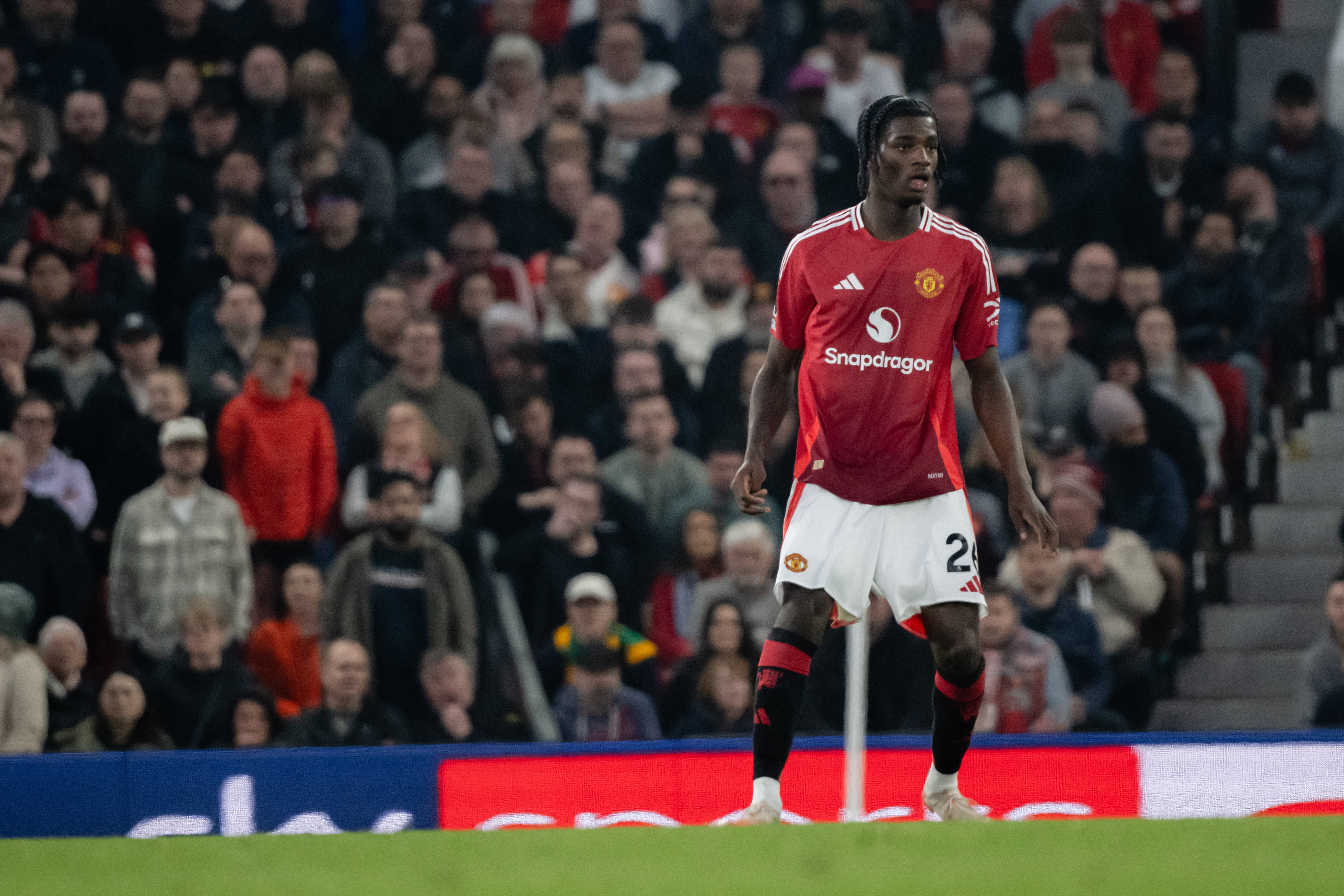 Ayden Heaven of Manchester United in action against Arsenal