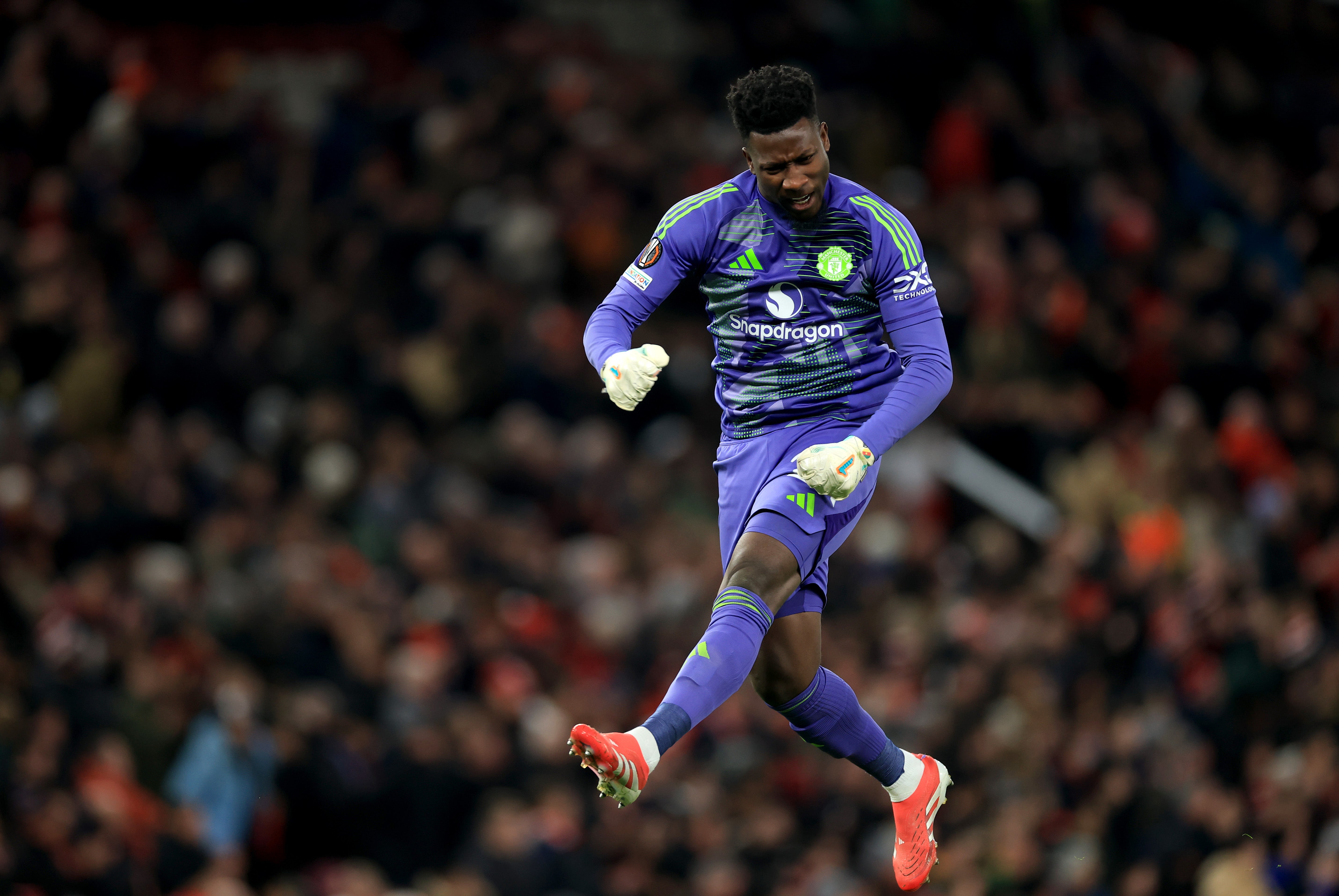 United’s stopper Andre Onana celebrates after Bruno Fernandes scores
