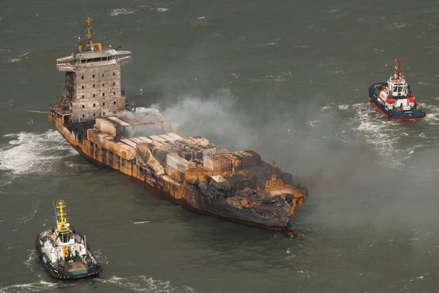 <p>Smoke billows from the MV Solong cargo ship in the North Sea</p>