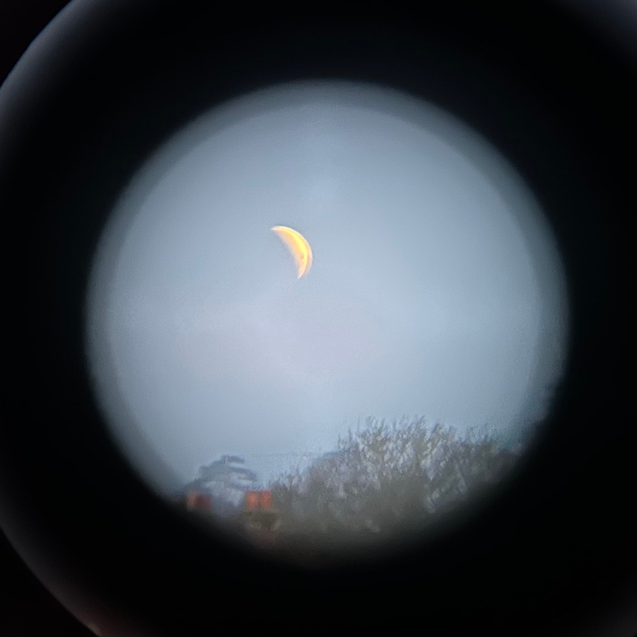 A picture of the blood moon taken through binoculars on the Isle of Wight (Ashley Cooper/PA)