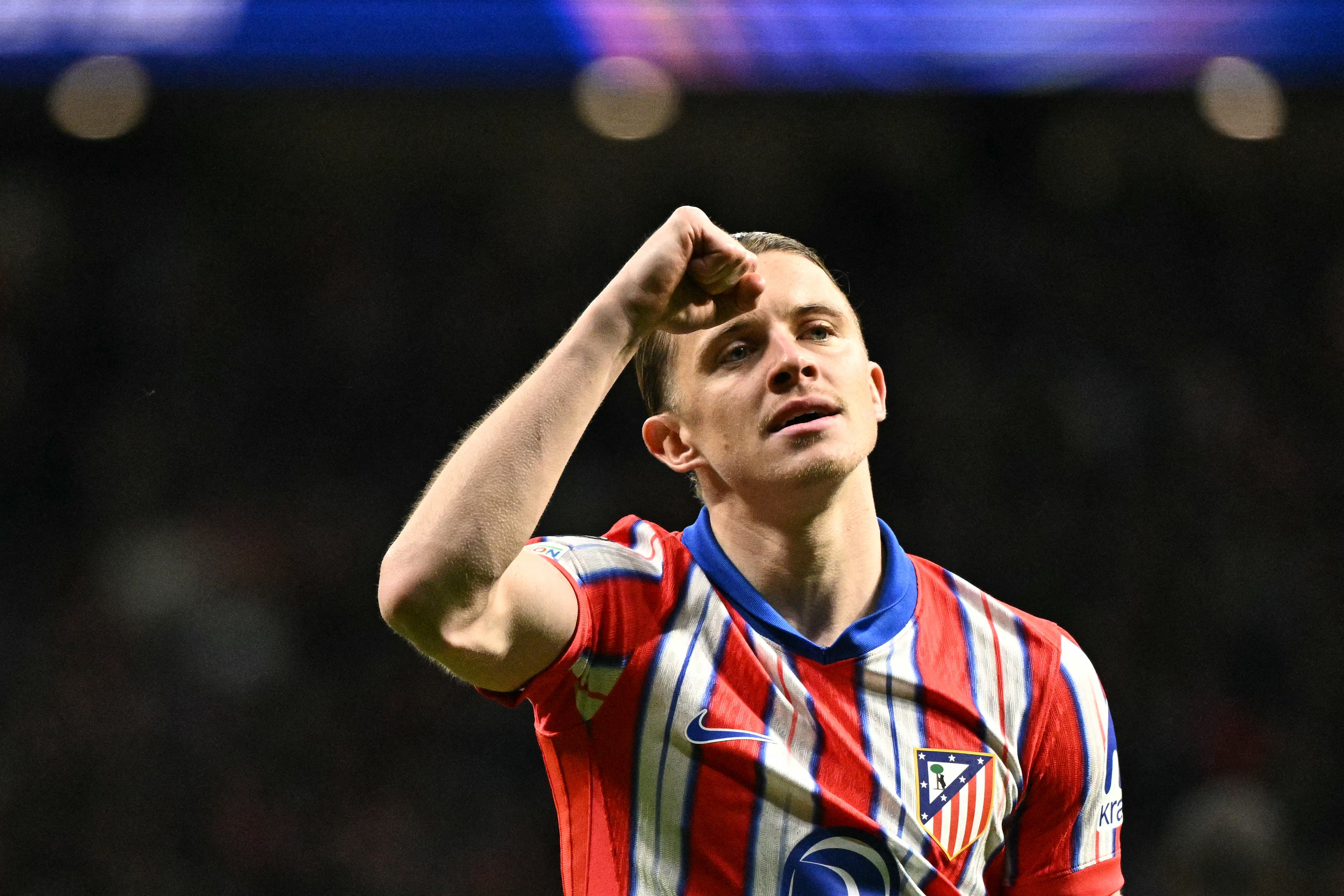 Atletico Madrid's English midfielder #04 Conor Gallagher celebrates