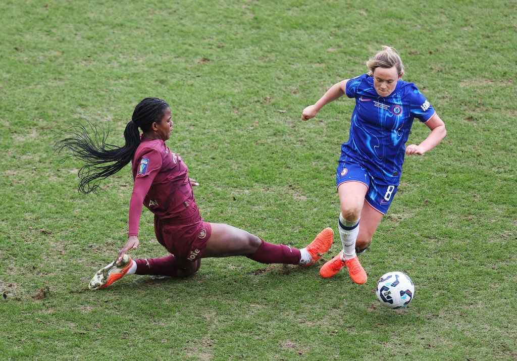 Erin Cuthbert is challenged by Khadija Shaw during the League Cup final at Pride Park
