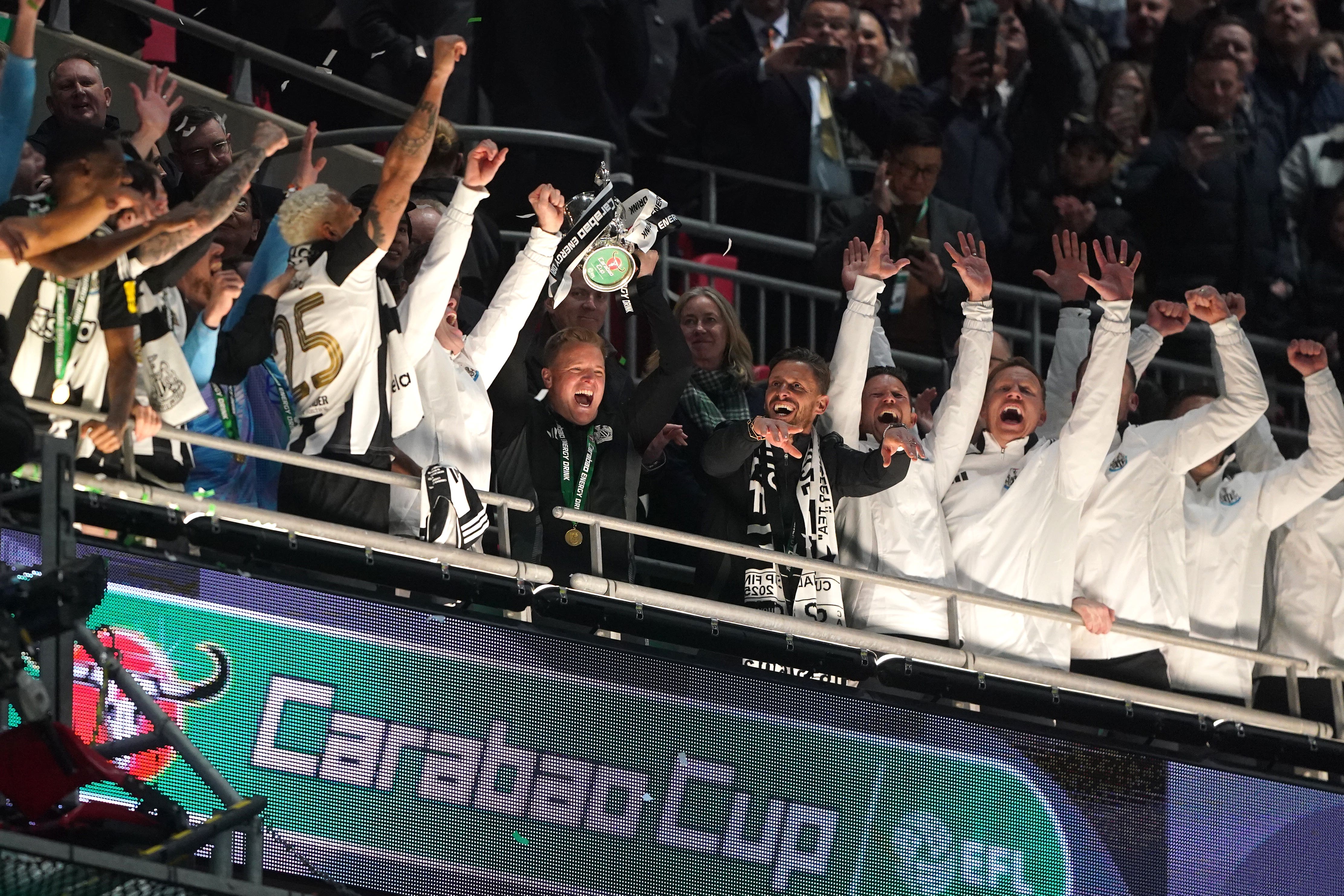 Newcastle manager Eddie Howe lifts the Carabao Cup (Owen Humphreys/PA)
