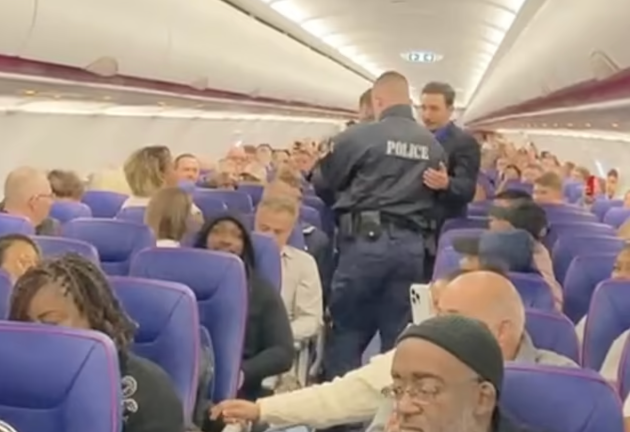 Police attend an alleged antisocial behaviour on a recent Wizz Air flight