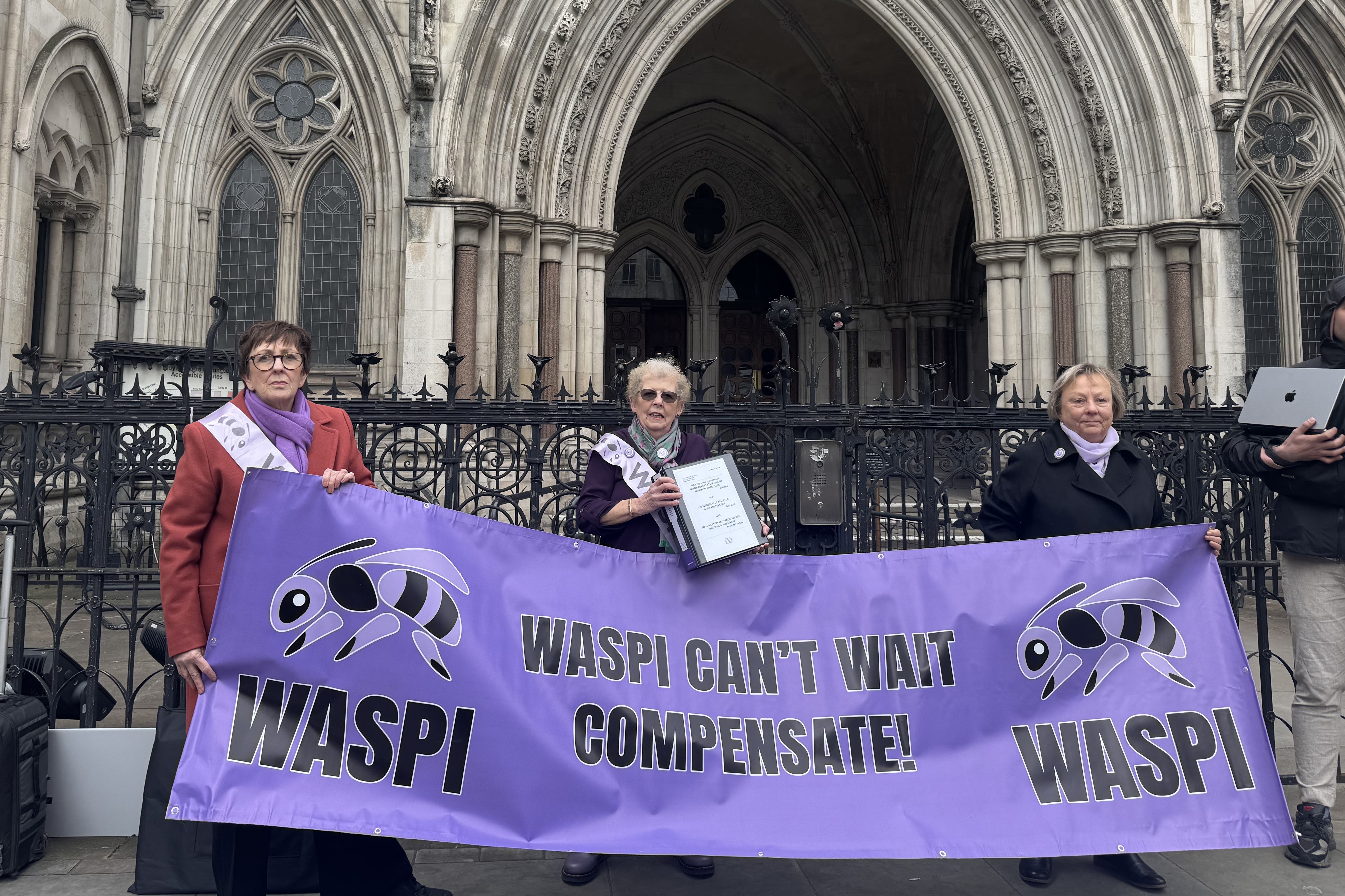 Waspi campaigners outside the Royal Courts of Justice (Haixin Tan/PA)