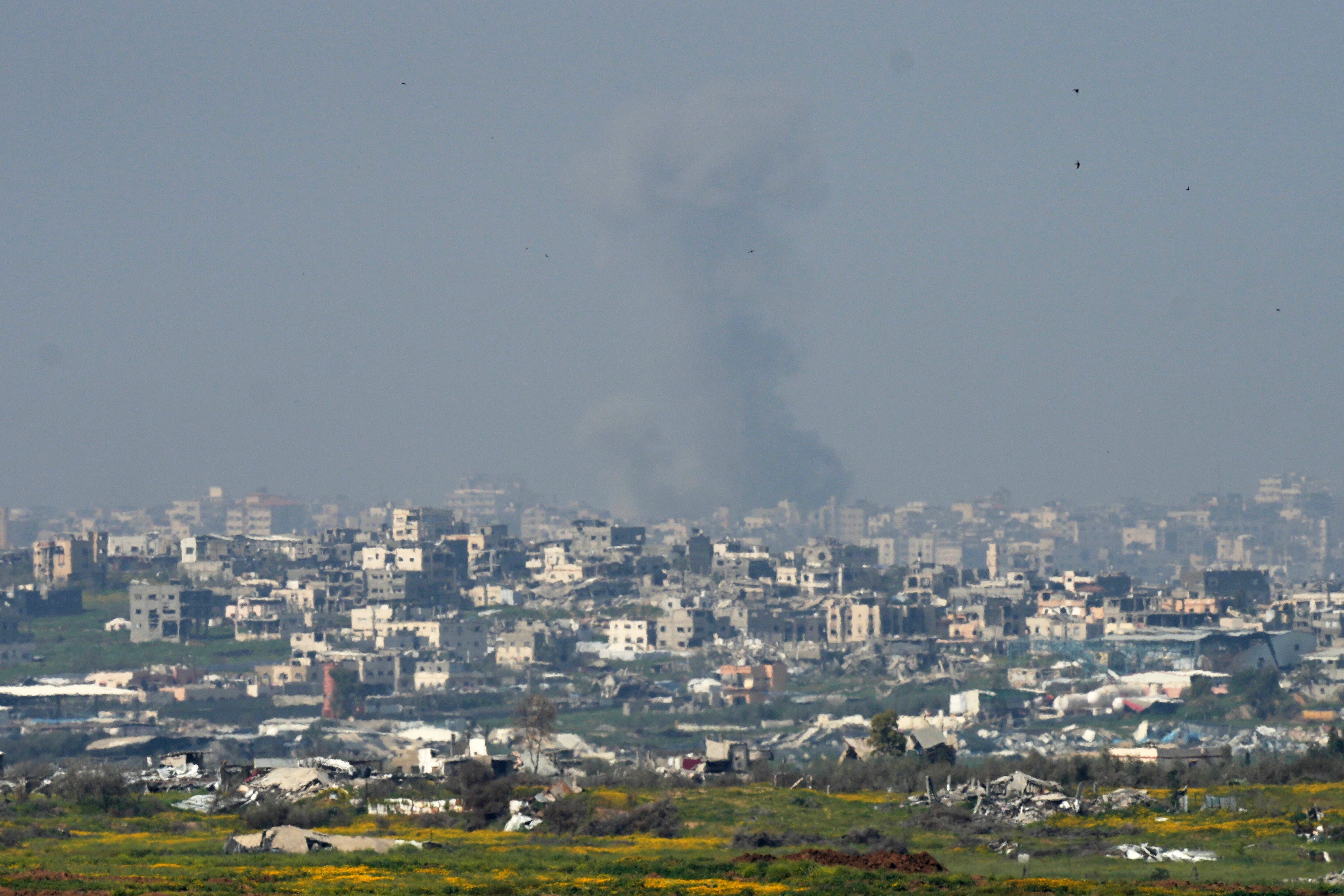Smoke rises following an Israeli bombardment in the northern Gaza Strip (Ohad Zwigenberg/AP)
