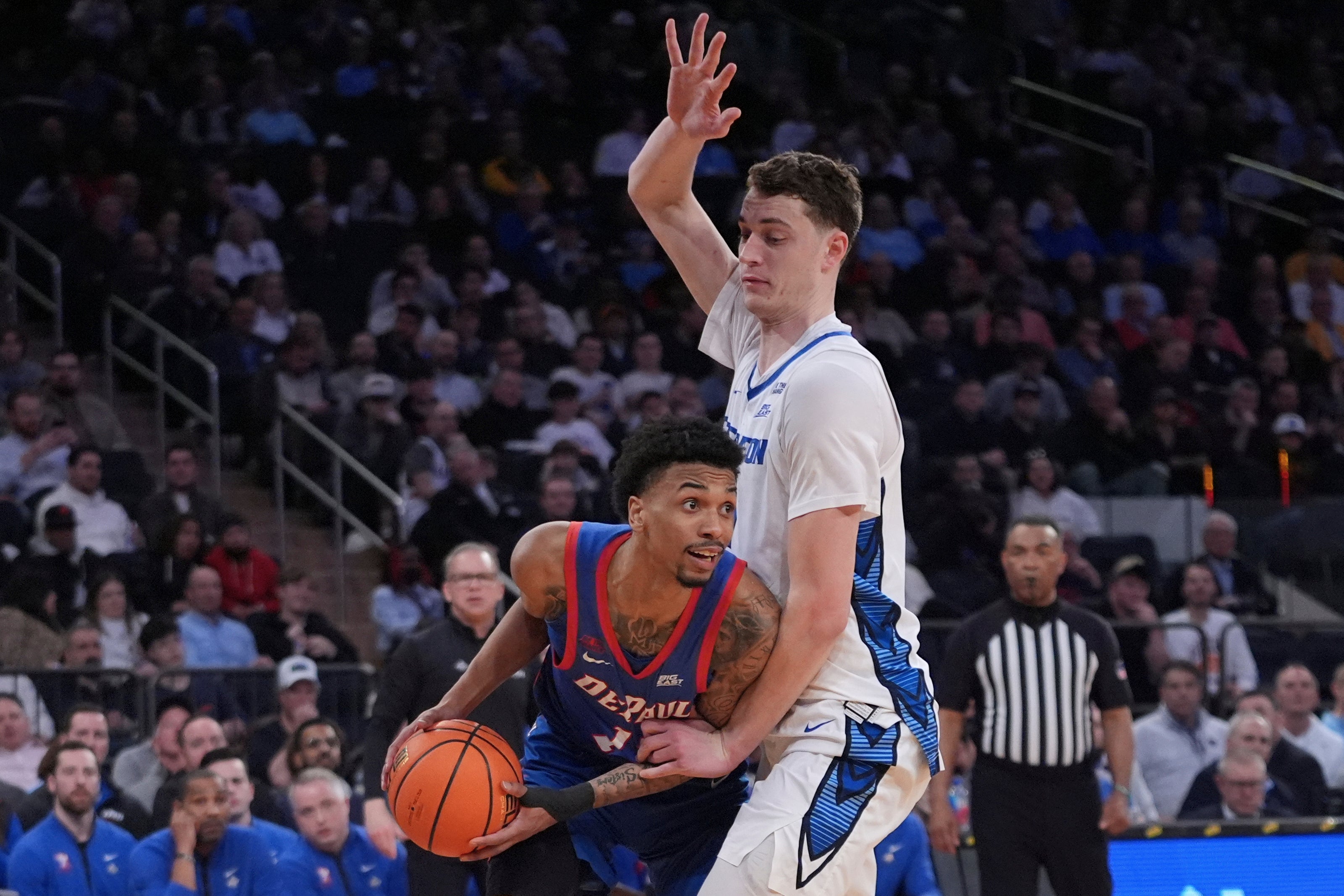Creighton's Ryan Kalkbrenner, right, defends DePaul's CJ Gunn (11) during the second half of an NCAA college basketball game at the Big East basketball tournament Thursday, March 13, 2025, in New York.