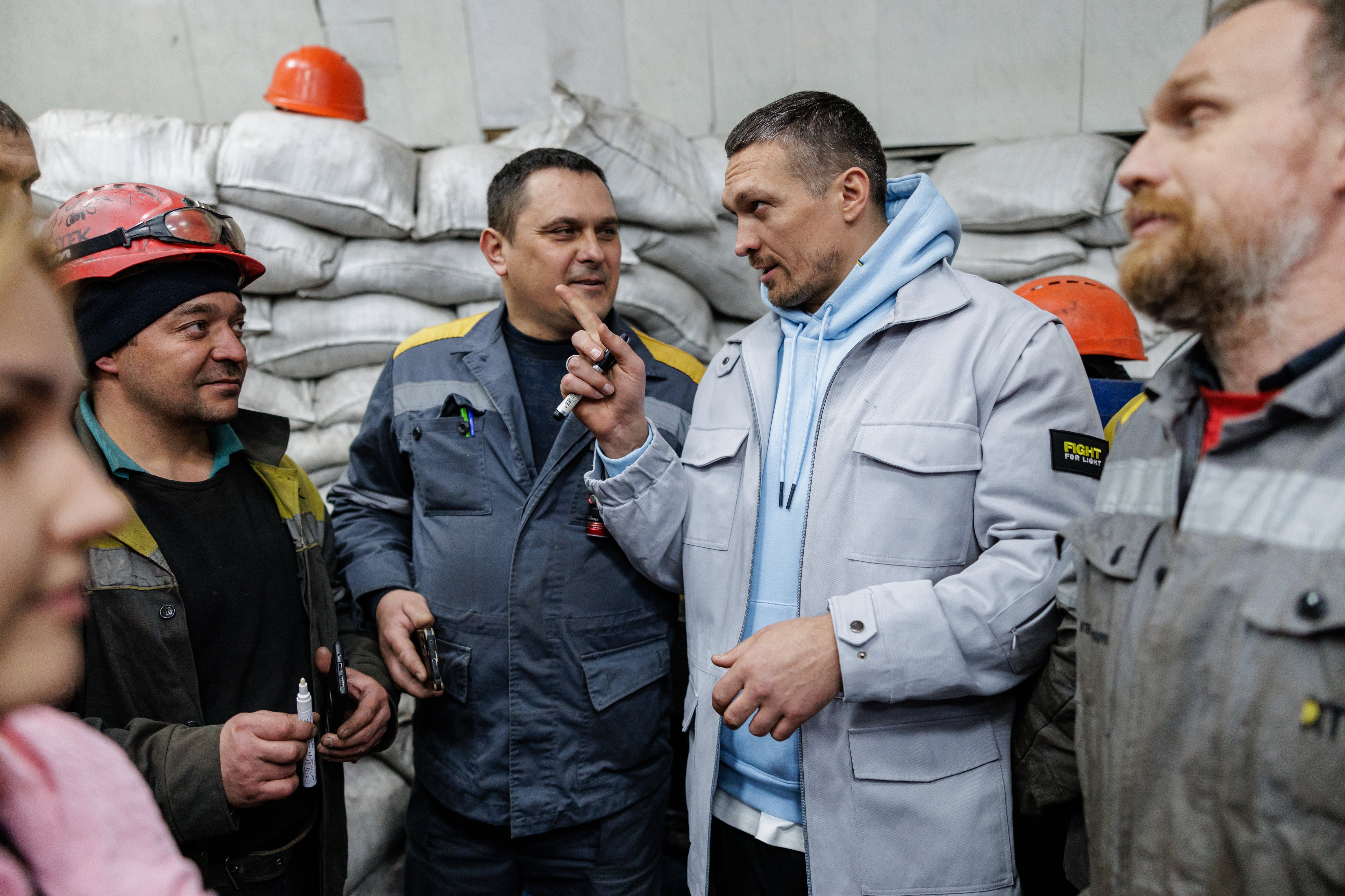 Usyk spoke with frontline workers about the dangers of working at an energy plant in Ukraine