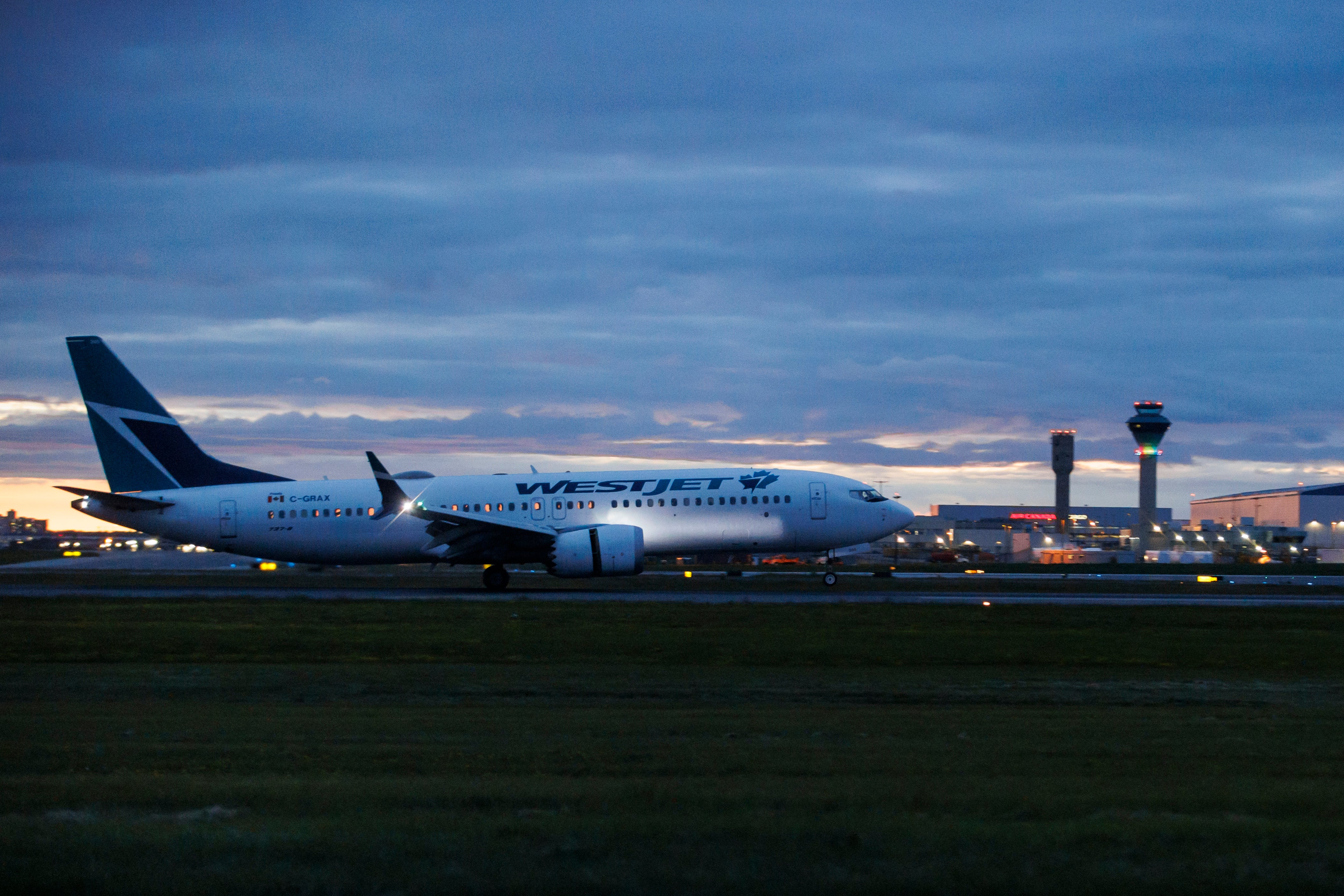 A Westjet 737 Max arrives at Toronto Pearson International Airport on June 30, 2024, in Toronto, Canada. The airline has said that it has seen bookings change from the U.S. to Mexico and the Caribbean
