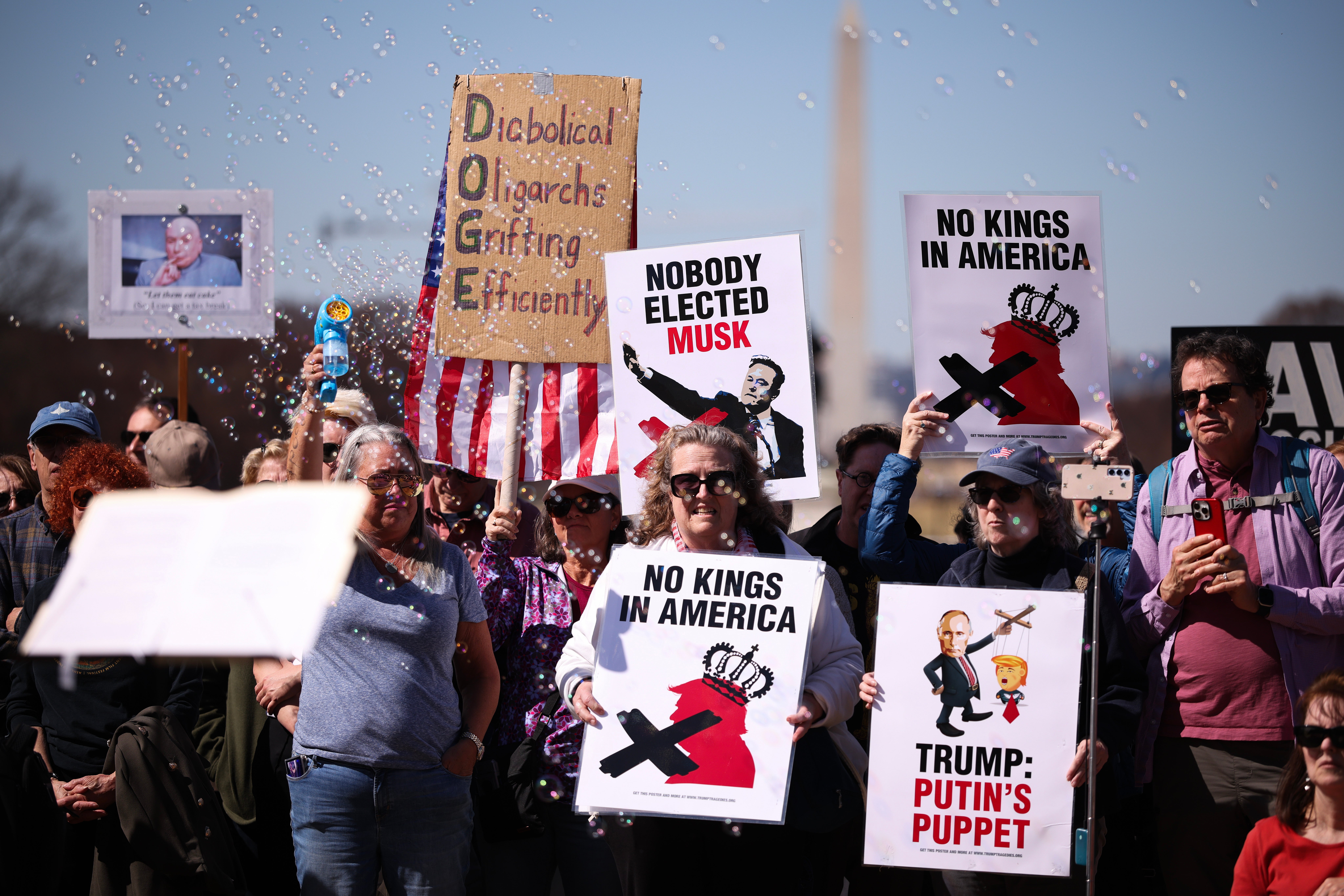 Demonstrators in Washington, D.C. protest DOGE efforts to slash the federal workforce and shutter agencies on March 10