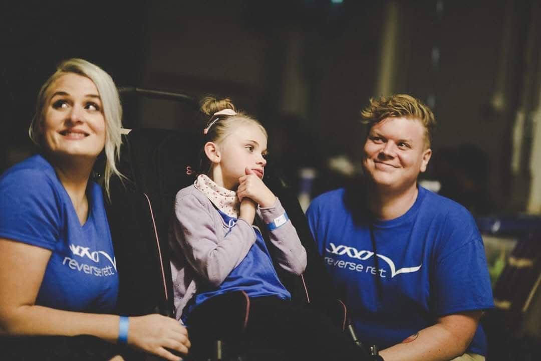 Katherine (left) is fundraising for her daughter Lucy (centre) with her partner Dan (right)