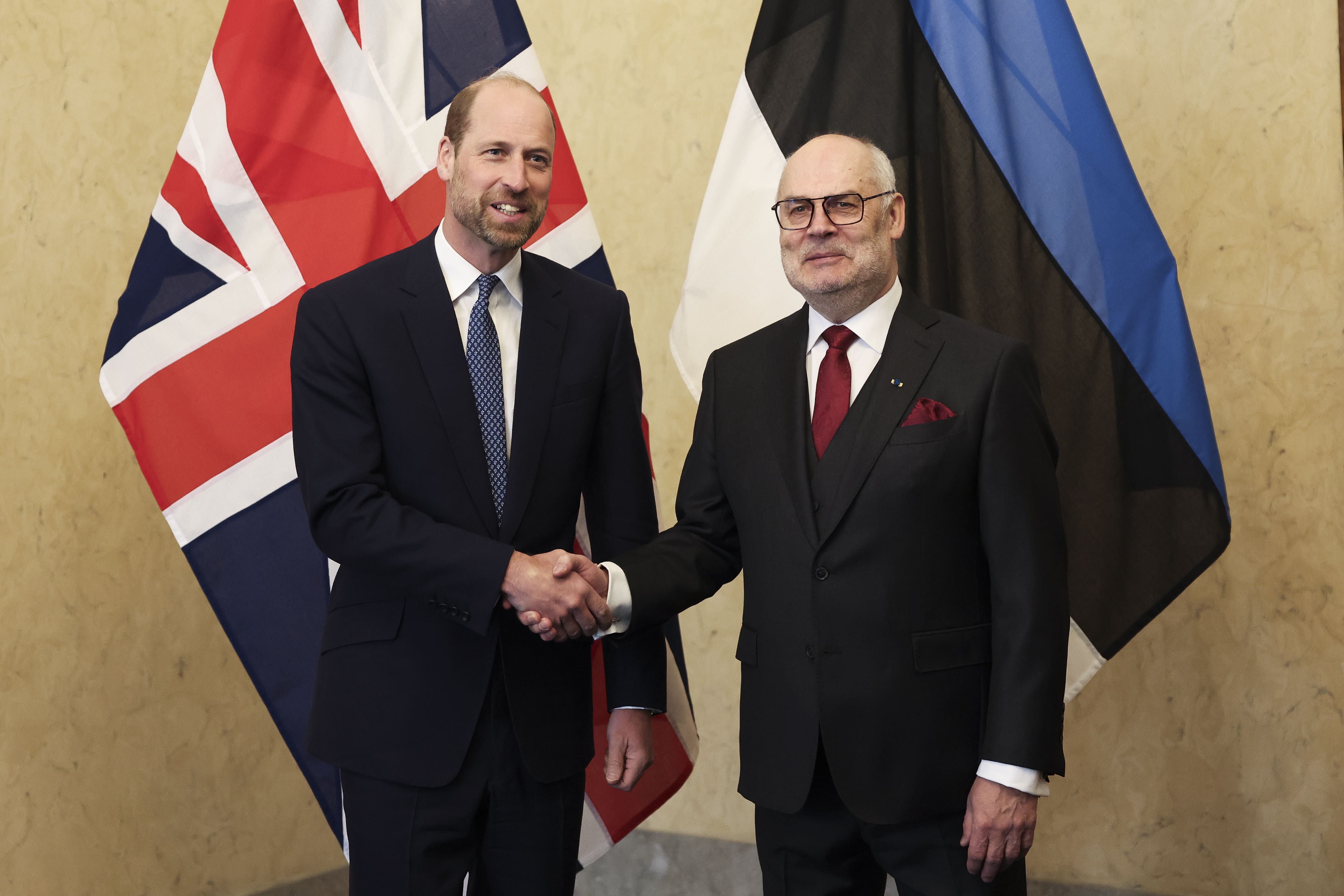 The Prince of Wales (left) shakes hands with the President of Estonia Alar Karis at the Presidential Office in Tallinn (Suzanne Plunkett/PA)