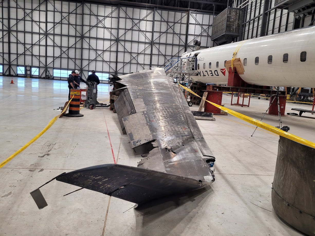 The broken wing of the CRJ-900 aircraft