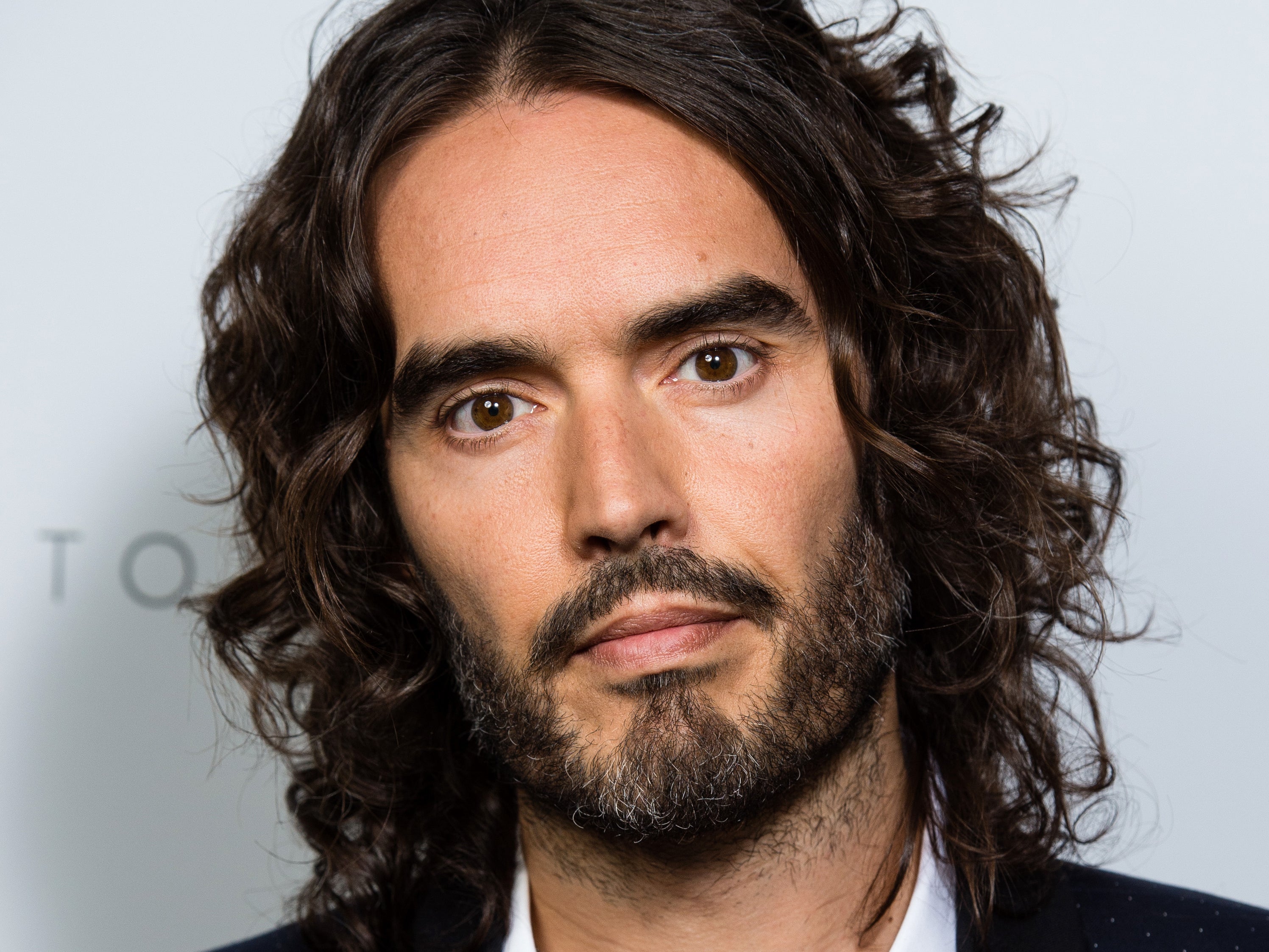 Russell Brand denies all allegations. He will appear in court next month