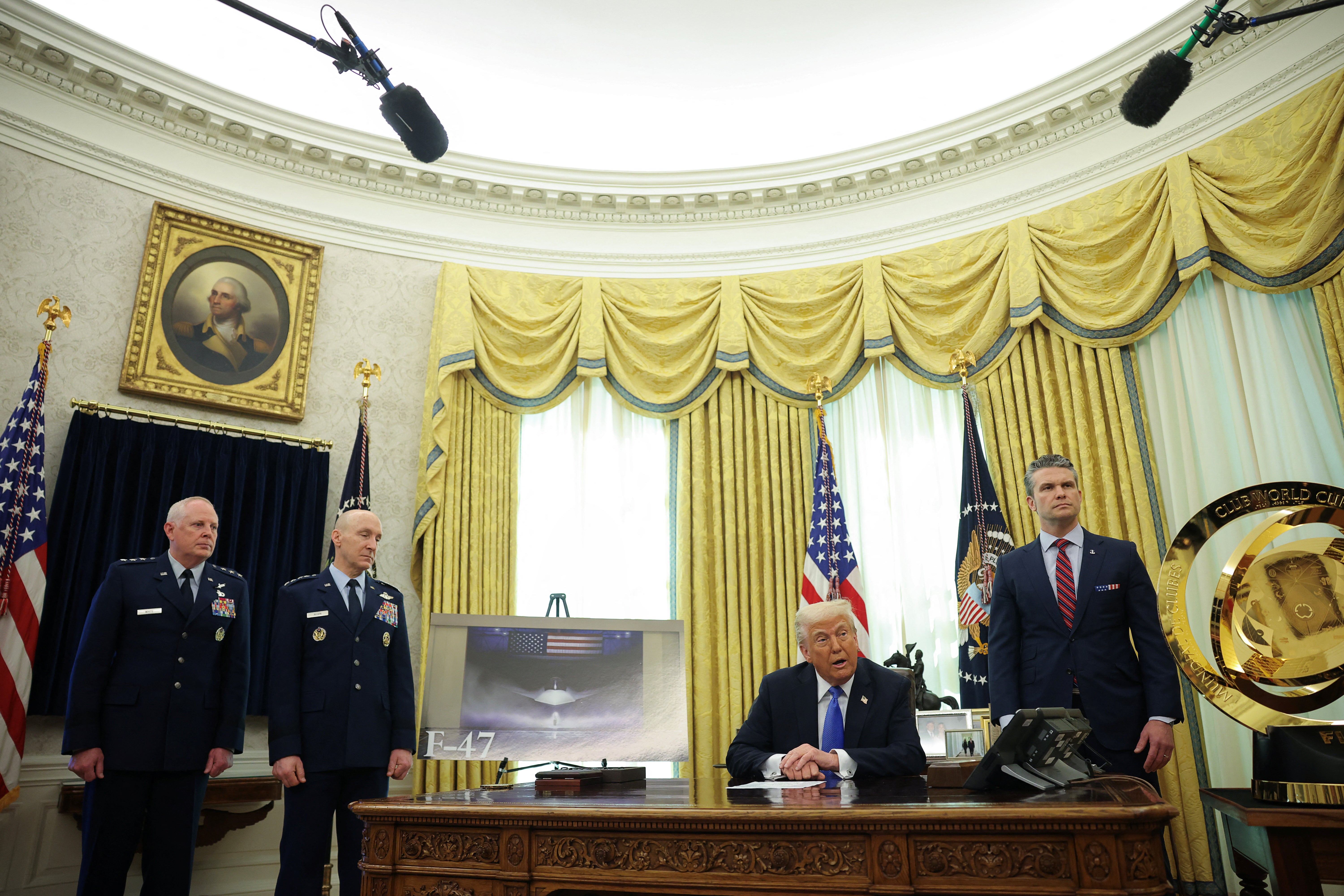 U.S. President Donald Trump delivers remarks with Defense Secretary Pete Hegseth in the Oval Office