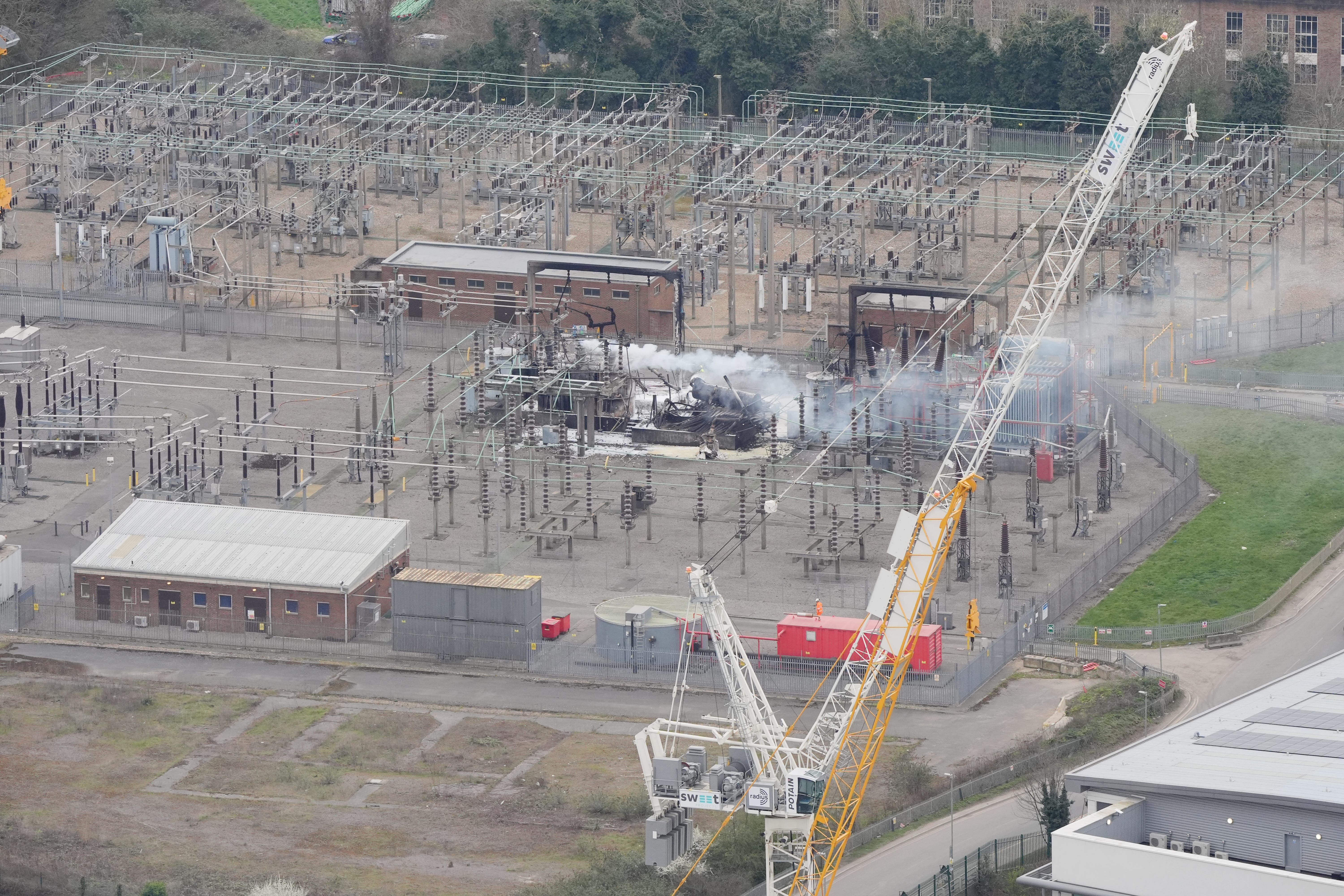 Smoke billows from the damaged North Hyde electrical substation (Jonathan Brady/PA)