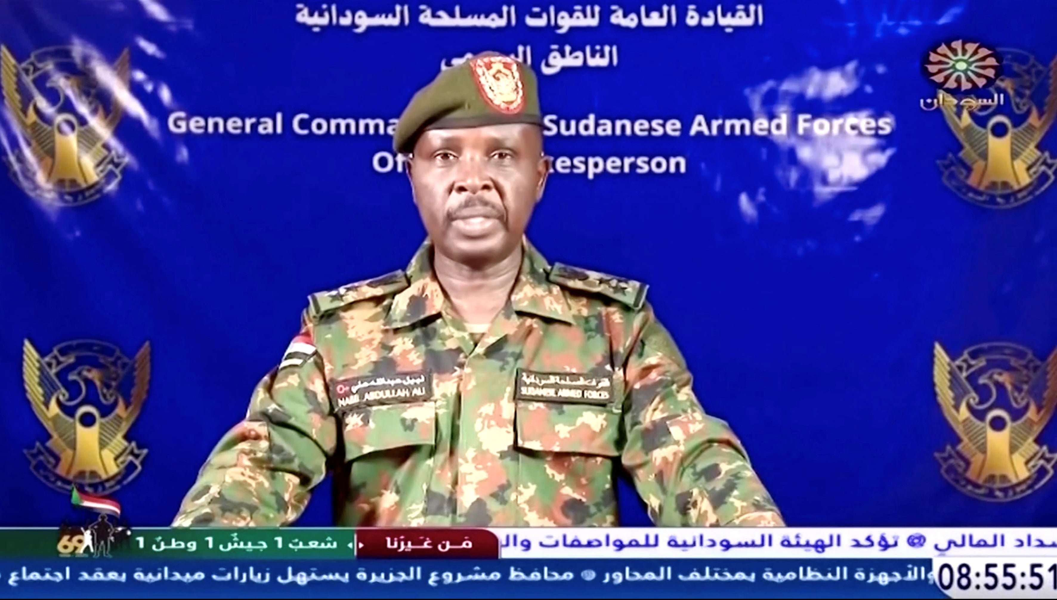 A Sudanese army spokesperson gives a statement after the military retook the Republican Palace in Khartoum