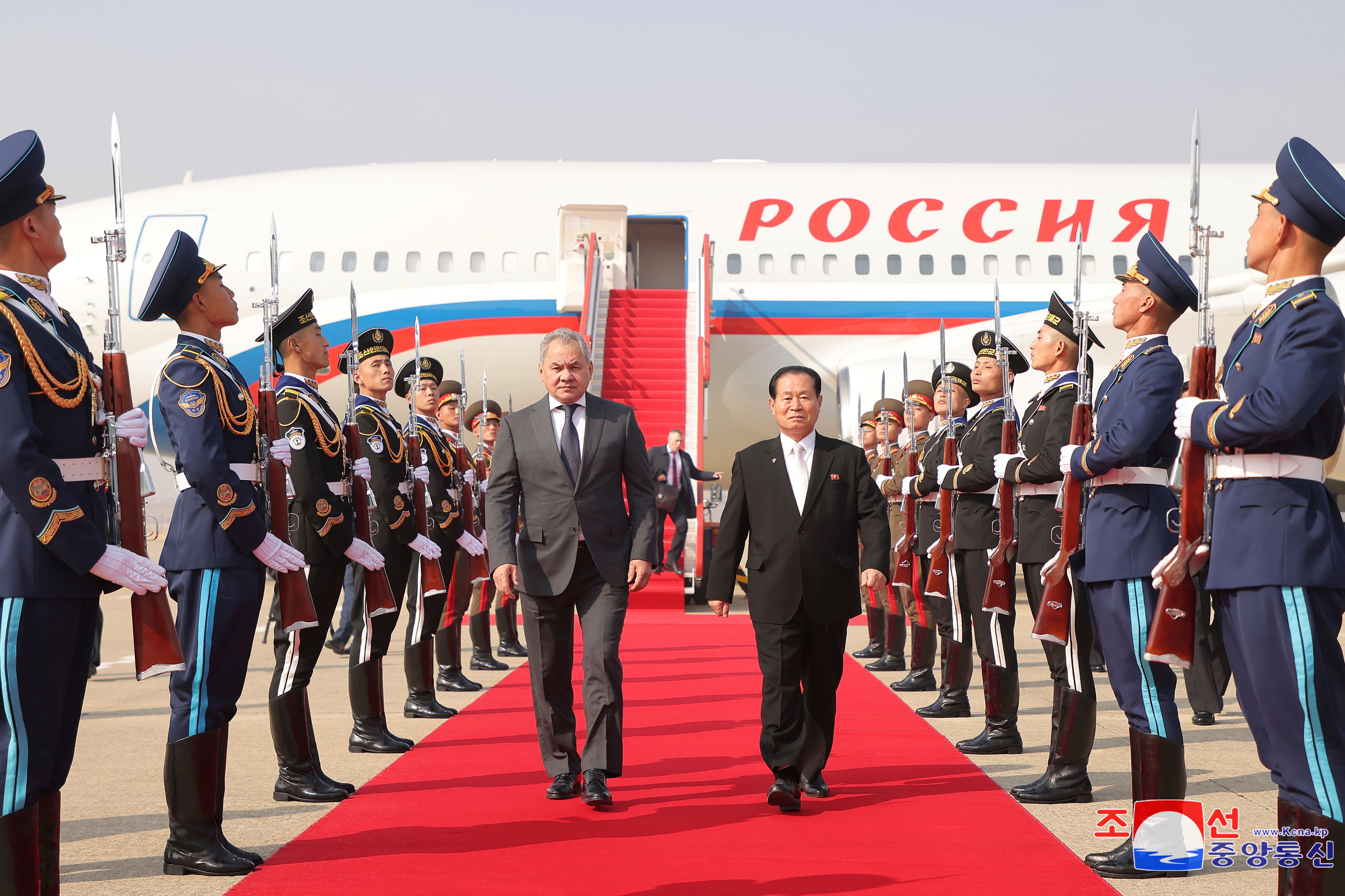 Russia's security council secretary, Sergei Shoigu, center left, who arrived at Pyongyang Airport being received by Party Secretary Park Chung-cheon